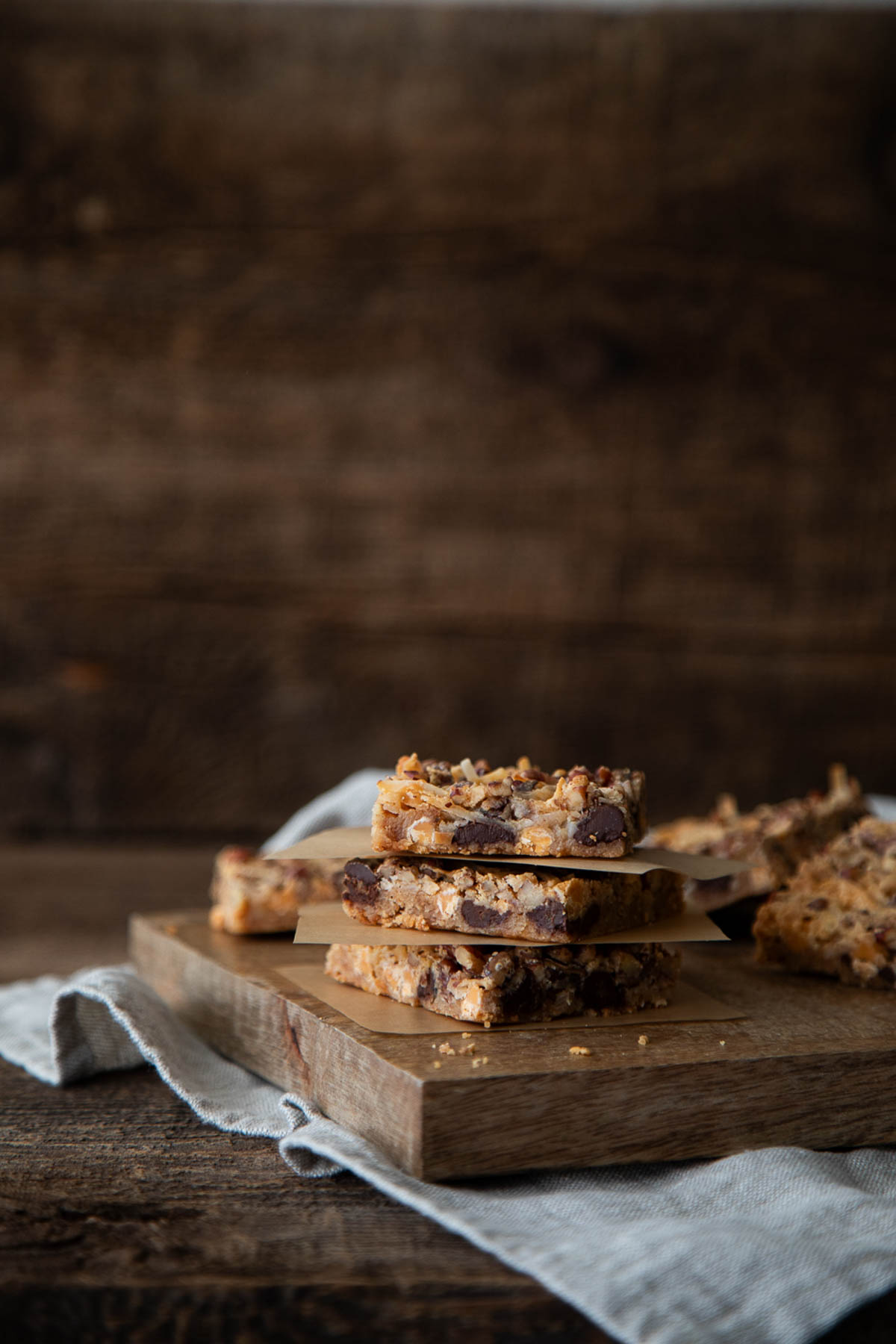 old fashioned 7 layer bars on cutting board