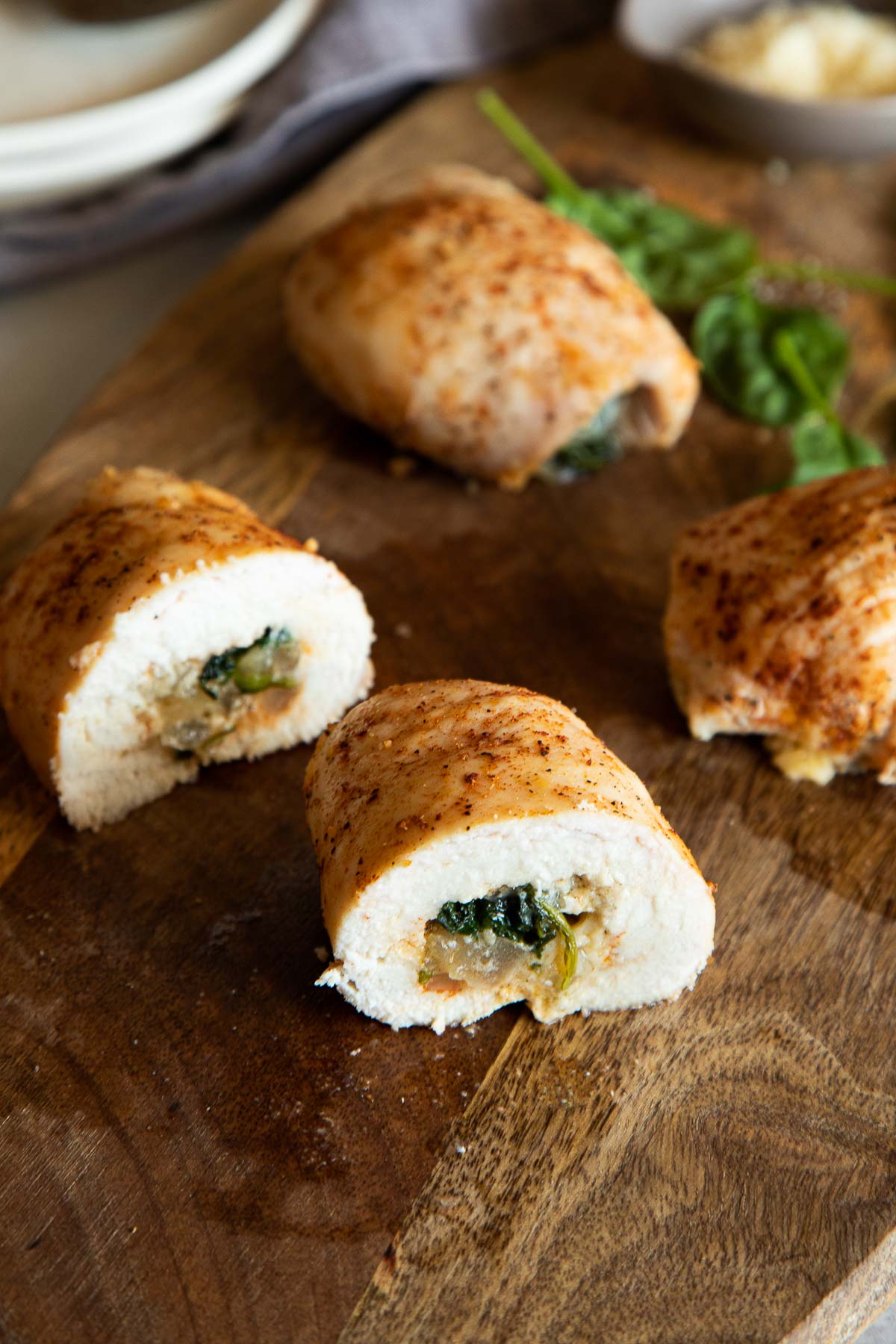Parmesan Chicken Roll Ups - cut in half - view from side