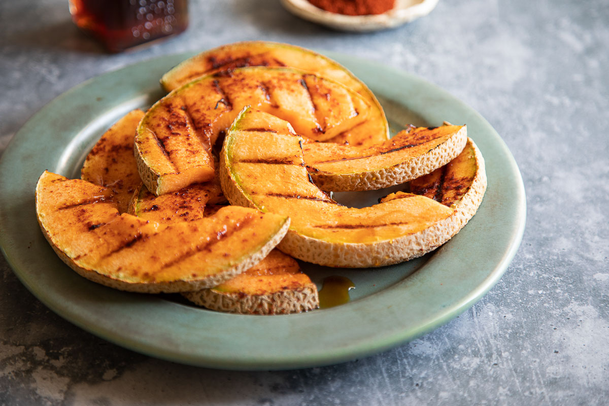 Grilled Cantaloupe on Pale Turquoise Plate