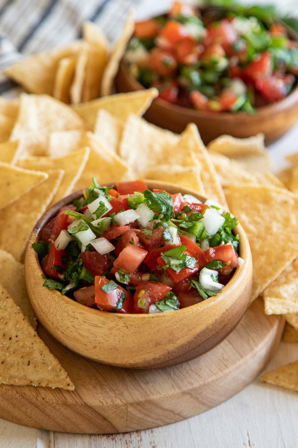 Homemade Pico de Gallo in Small Wooden Bowl with Chips