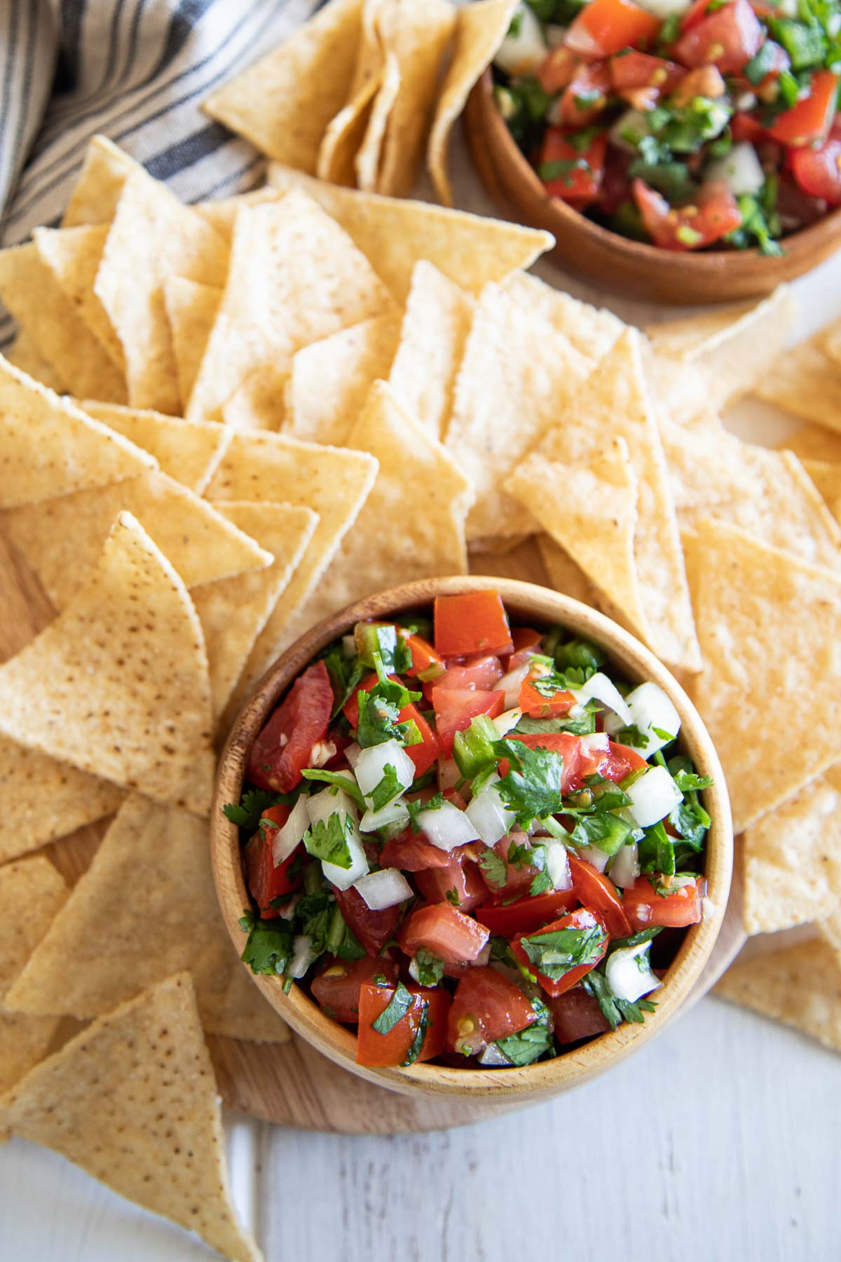 Looking down at Homemade Pico de Gallo Salsa and Chips. Appetizer.