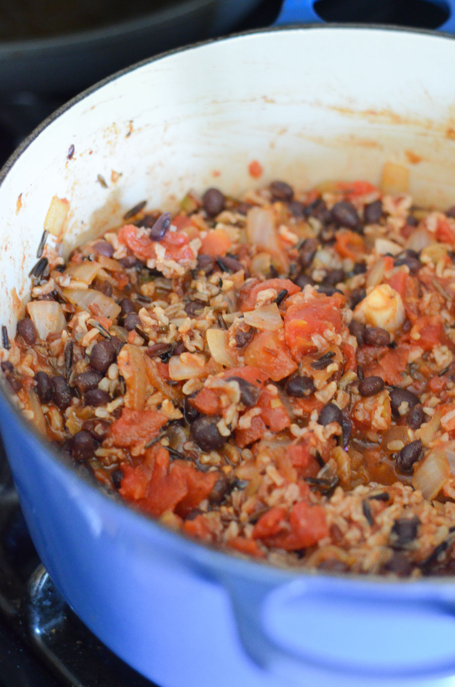 Rice, Beans, and Veggies mixed in Blue Le Creuset pot