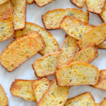 Homemade Cheddar + Herb Cheese Crackers Recipe. Delicious homemade crackers with fresh rosemary - a great snack or appetizer.