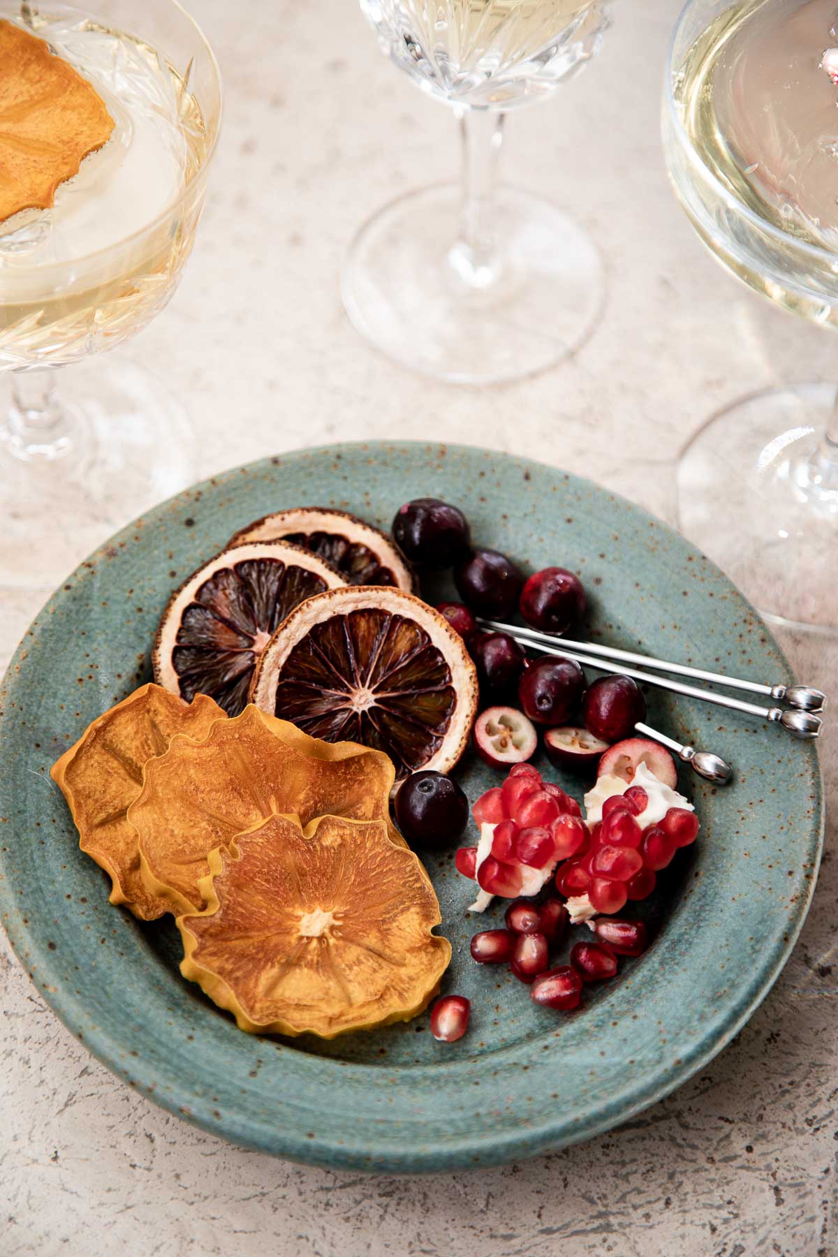 Plate of festive prosecco serving garnishes