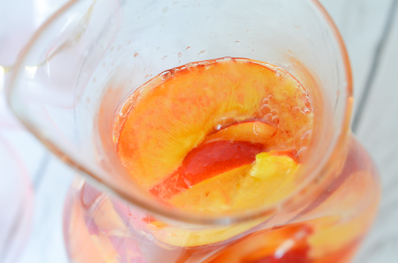 Nectarine Sparkling Rose Sangria w. Ginger + Orange Liqueur