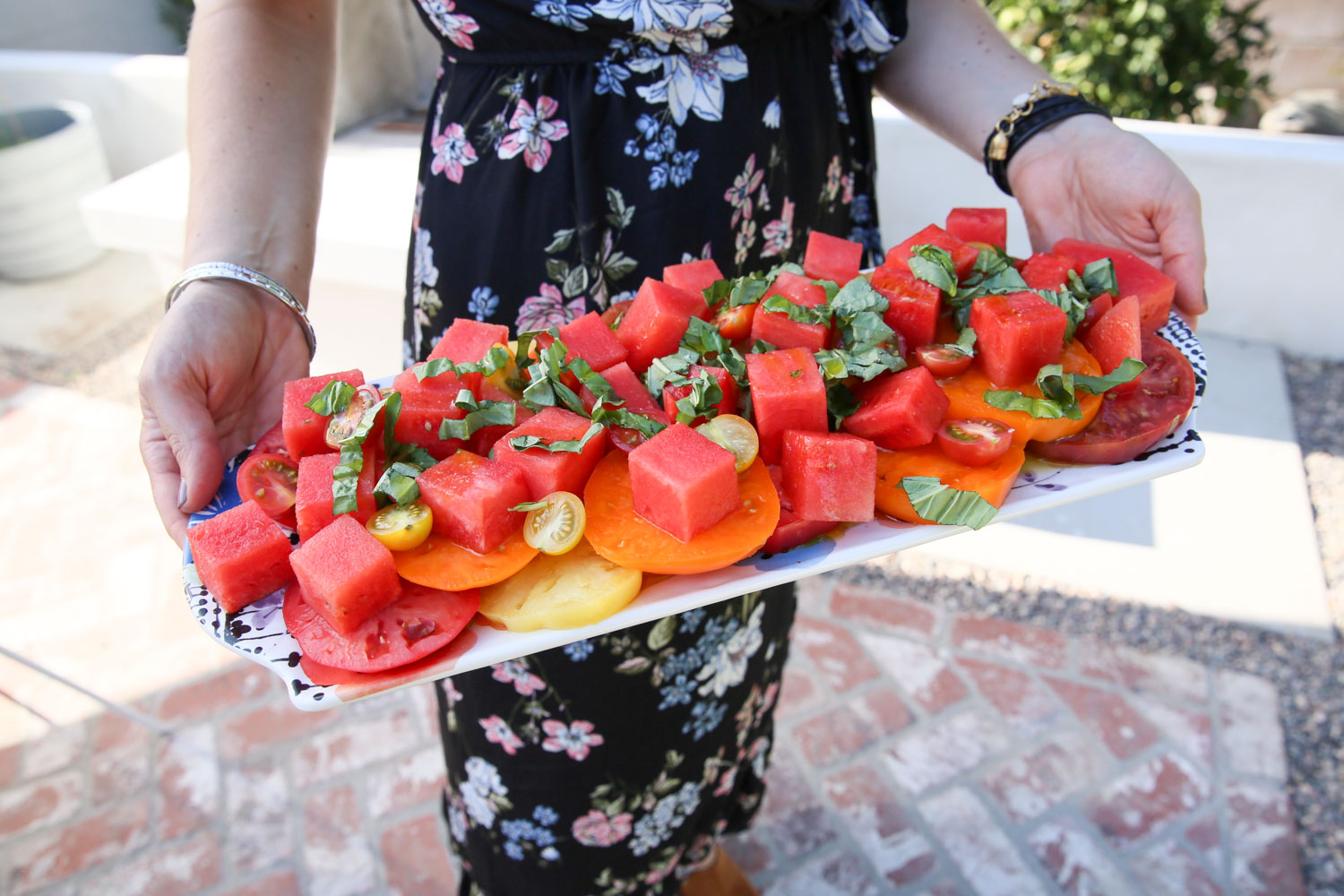 Backyard Entertaining - Watermelon and basil salad on large plate