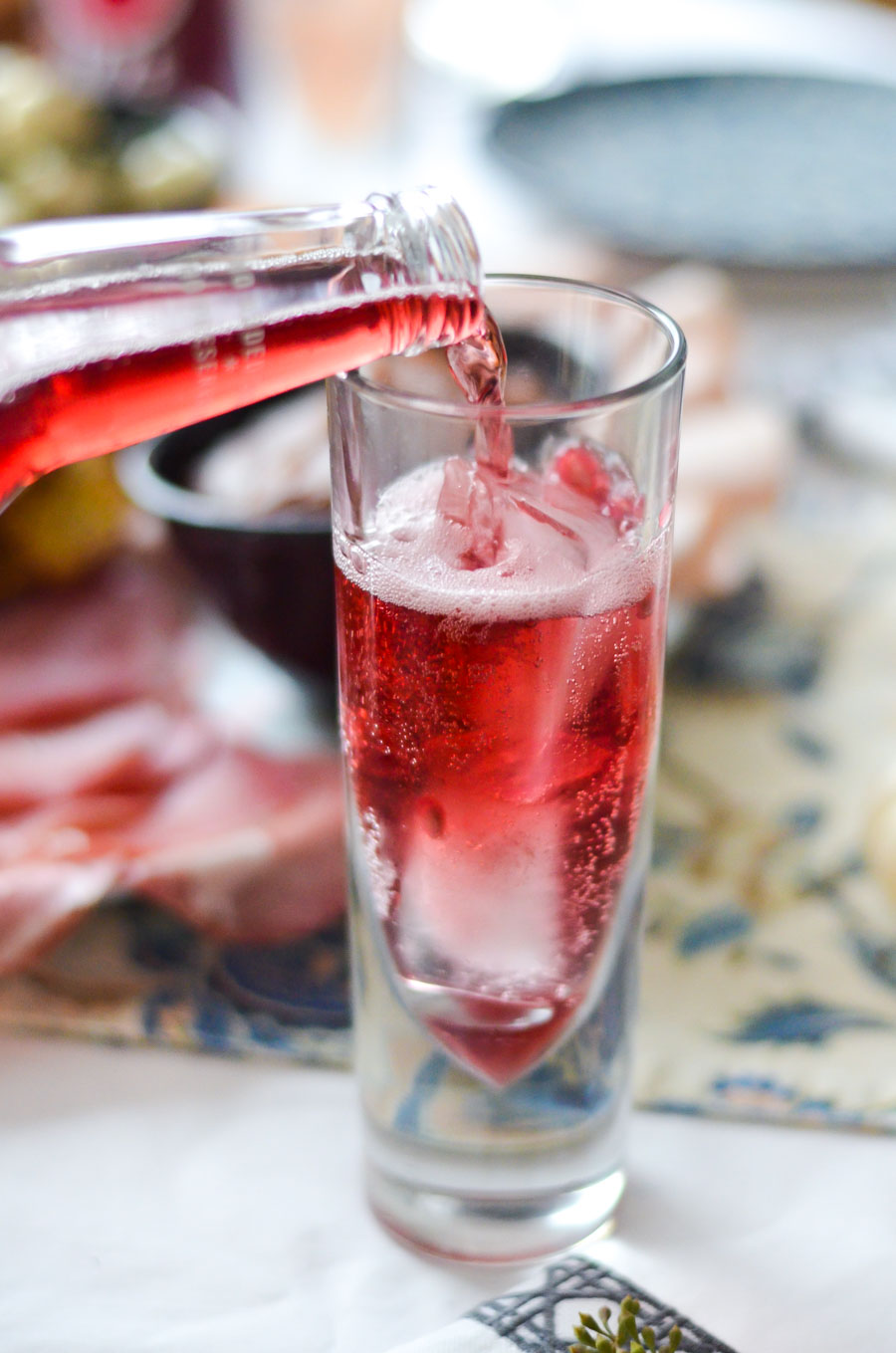 Backyard Entertaining - Pouring Drink into Glass