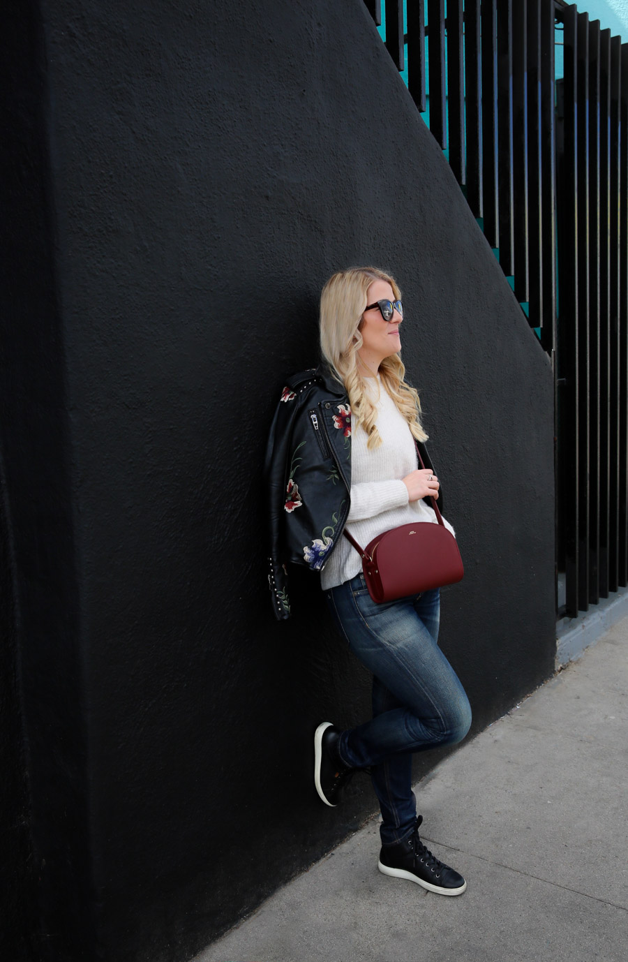 Black Sneakers Outfit for Women with Jeans + Leather Jacket
