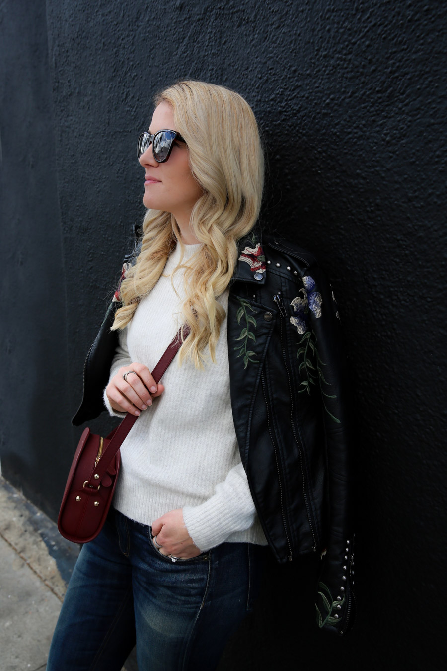 Black Sneakers Outfit for Women with Jeans + Leather Jacket