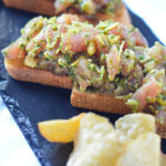 Tuna Tartare Toast Tartine. Sushi grade tuna steak mixed with delicious pesto, and a secret ingredient for flavor and crunch. Also sharing the secret to perfect pesto! - Zinque Cafe #LMrecipes #tuna #sushi #fish #appetizers #recipe #foodblog #foodblogger #healthy #pescetarian #healthyblogger #food
