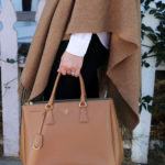 Tan Cape Outfit Idea with Boots + Button Down Shirt. Prada Saffiano Tote w. Suede Boots and Shawl.