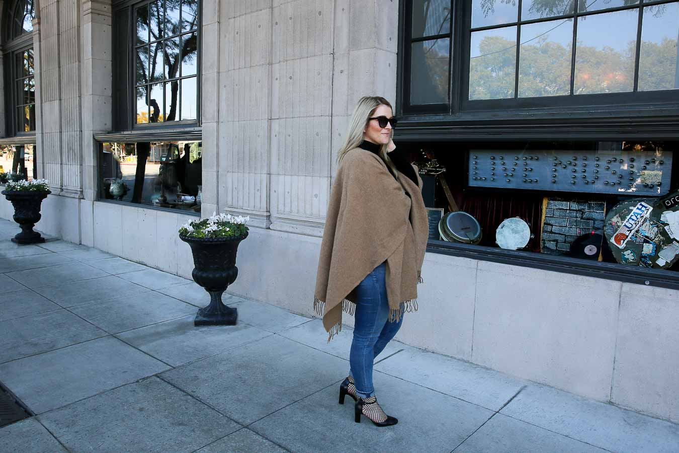 Layered Winter Outfit for Women with Shawl, Turtleneck, and Jeans