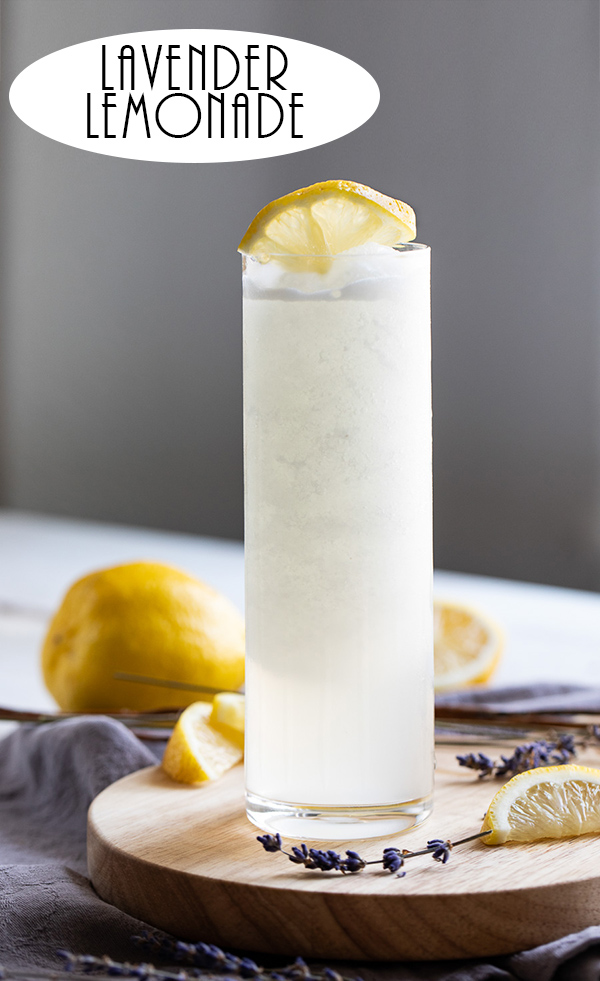 Frozen Lavender Lemonade Recipe. This spring and summer drink is easy and fun for everyone. A slushy recipe for grownups made with fresh lemons and lavender. Serve it at Easter, Mother's Day, Baby Showers, and any summer potluck. #lemonade #lavender #drink #drinkrecipe #foodblog