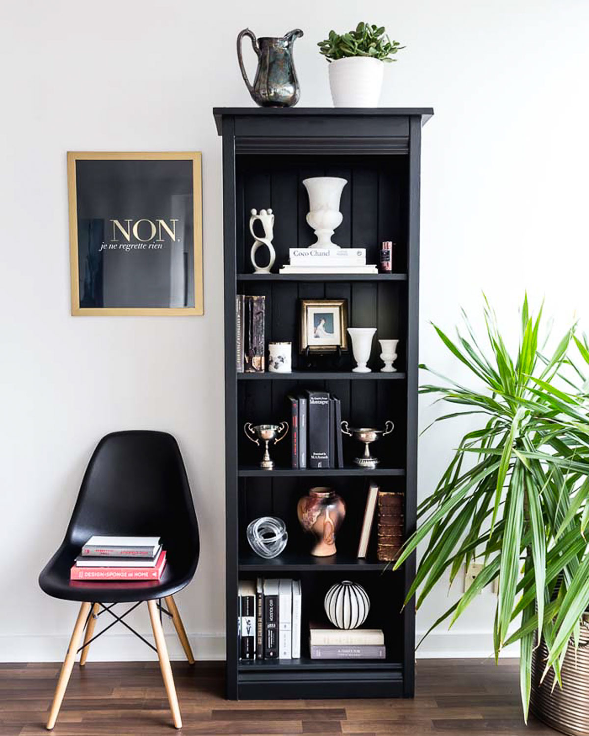 How to Style a Black Bookshelf - Books and Vases on Shelves