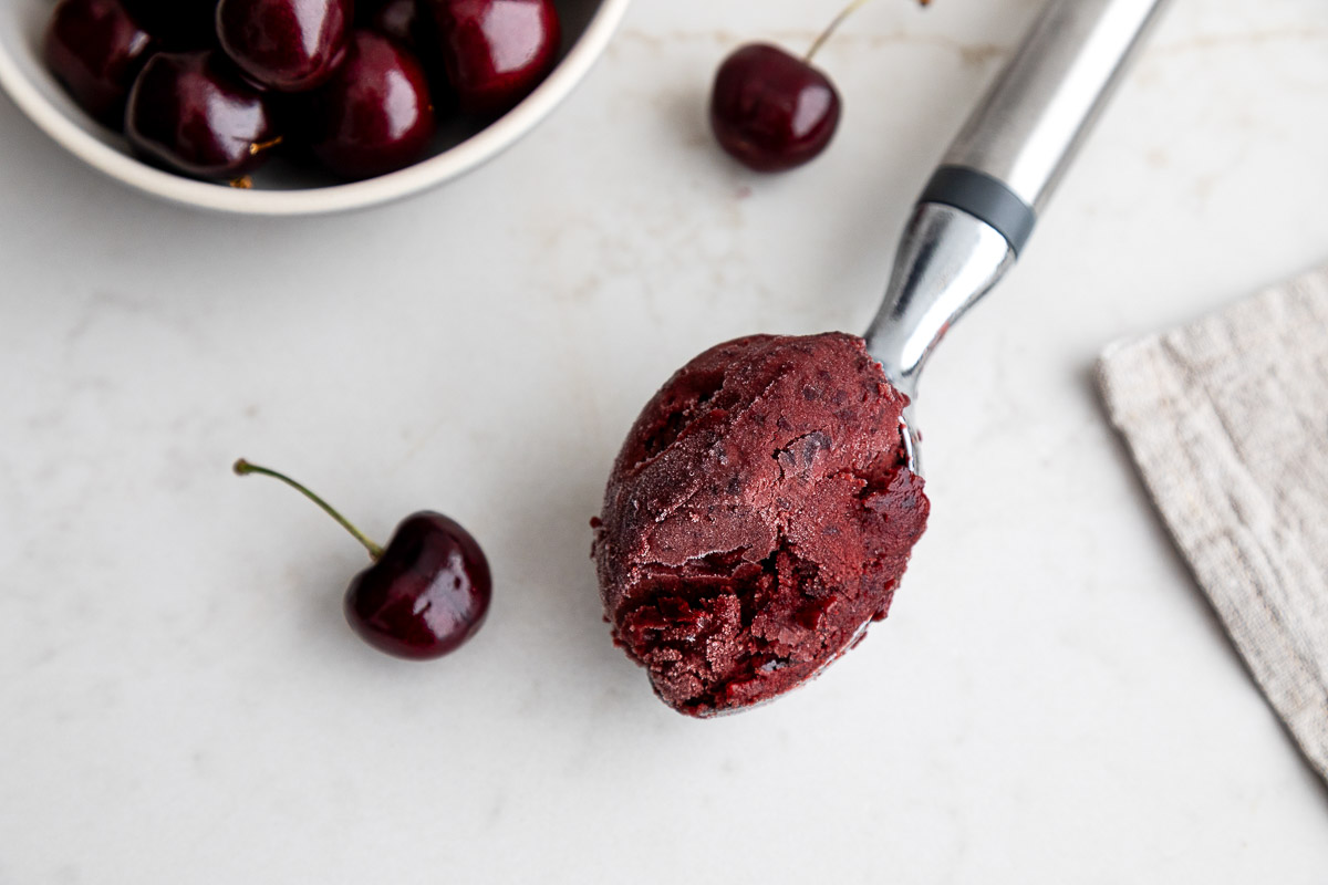 Cherry Sorbet on ice cream scoop - Dairy Free Sorbet