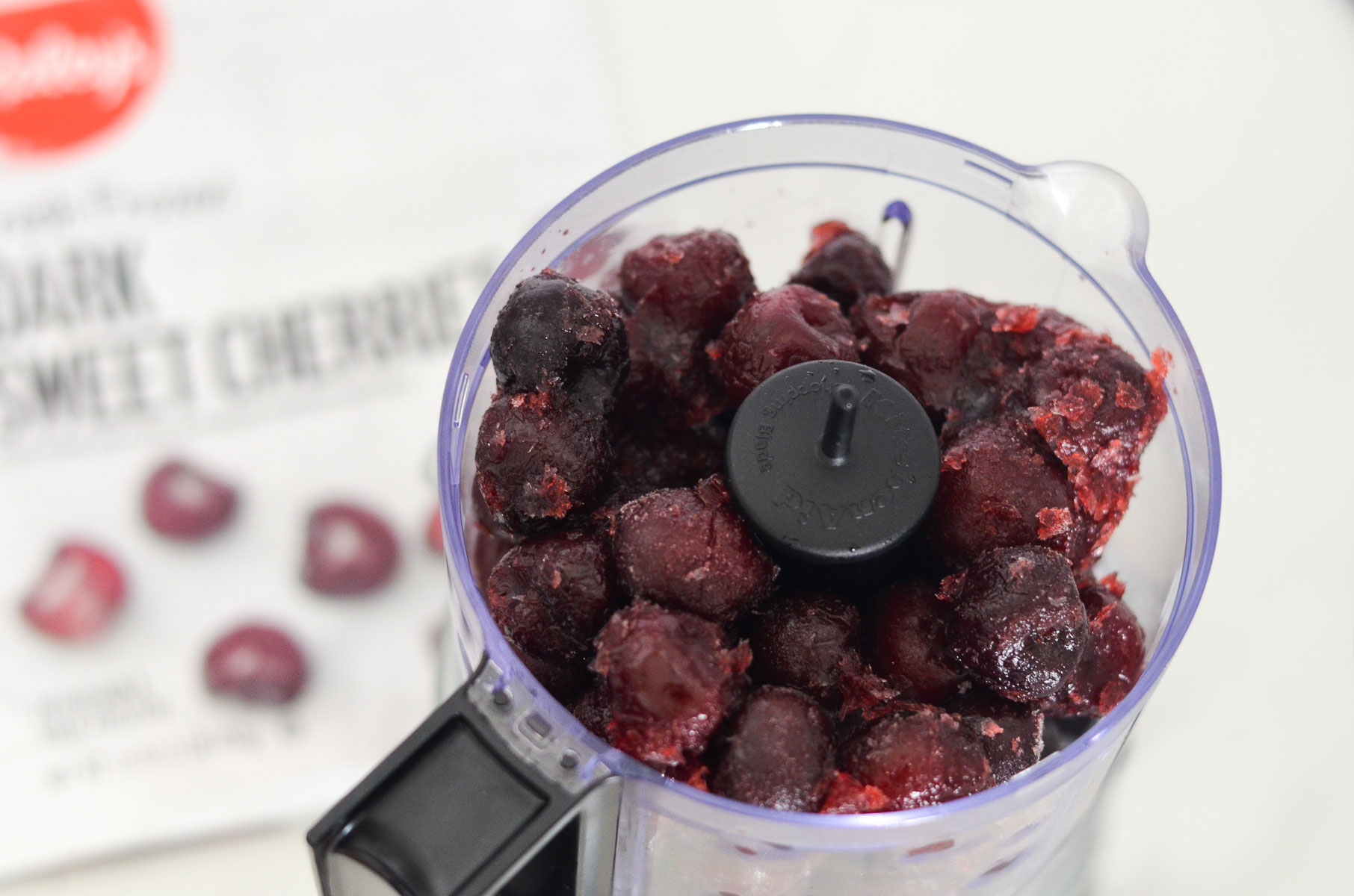 frozne cherries in food processor.