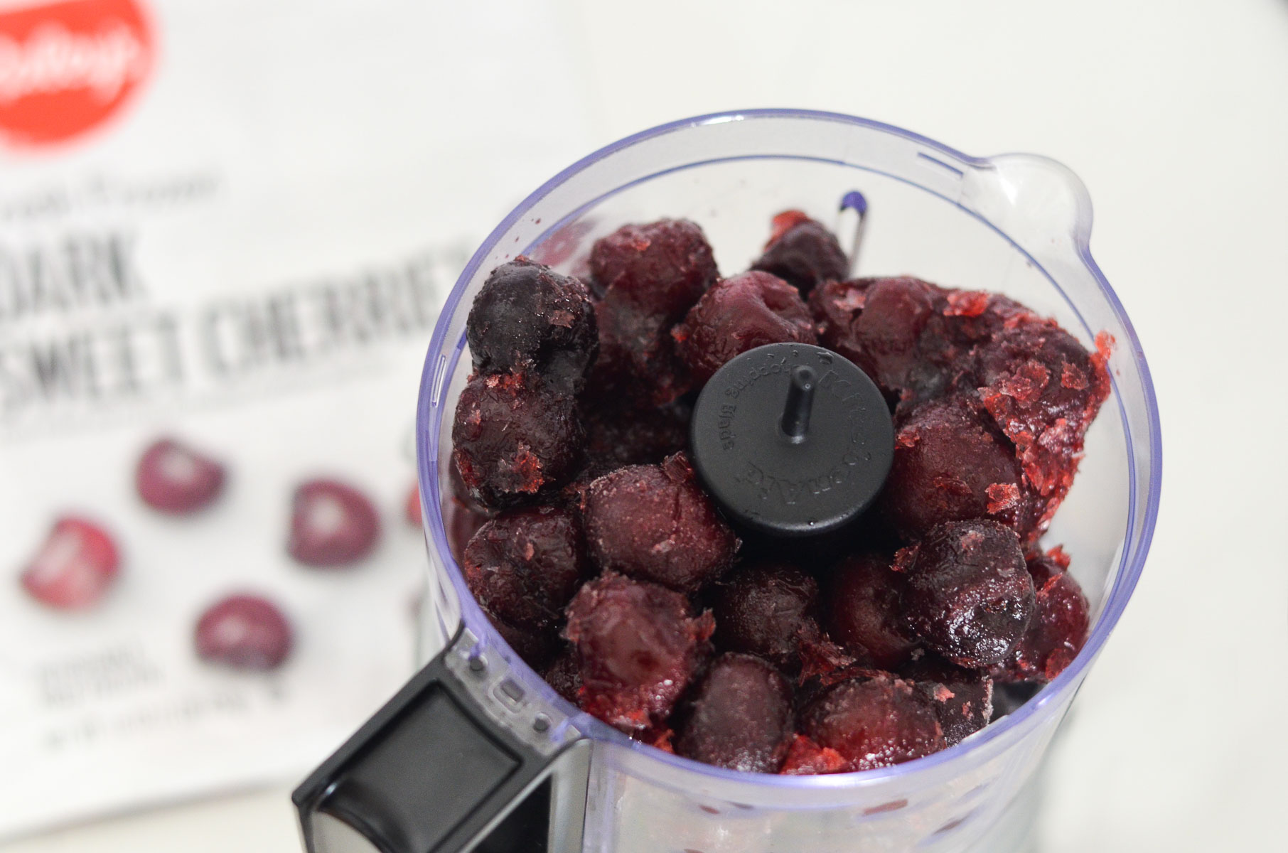 frozne cherries in food processor.