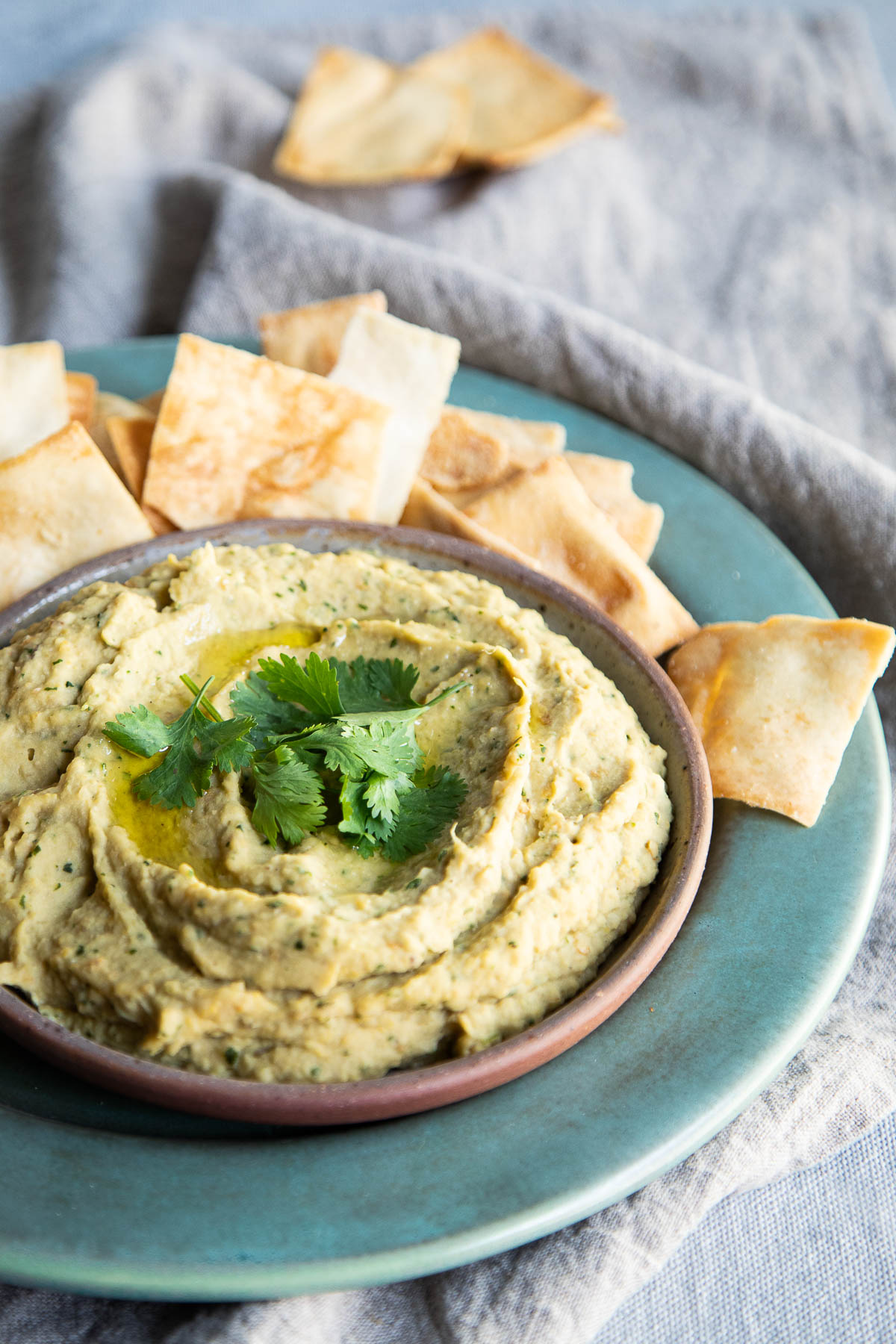 Roasted Eggplant Dip w. Chickpeas on plate with pita chips