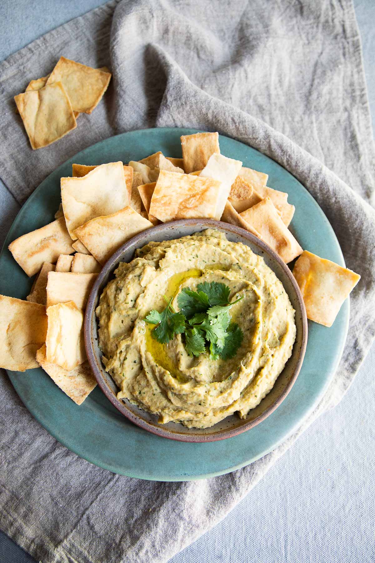 Roasted Eggplant Dip w. Chickpeas on plate with pita chips