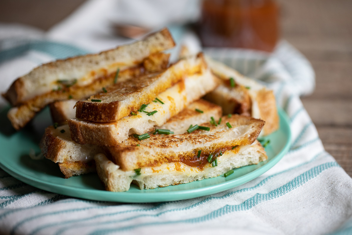 Pumpkin Butter Grilled Cheese Cut into sticks on turquoise plate