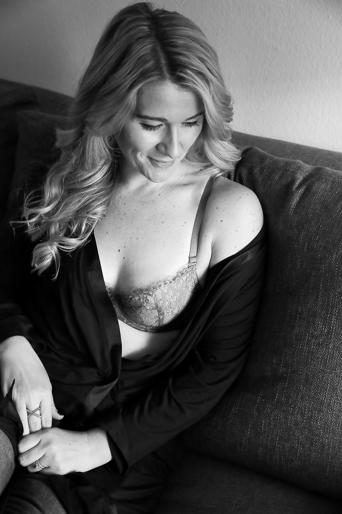Luci on Couch in black and white - sustainable undergarments writeup