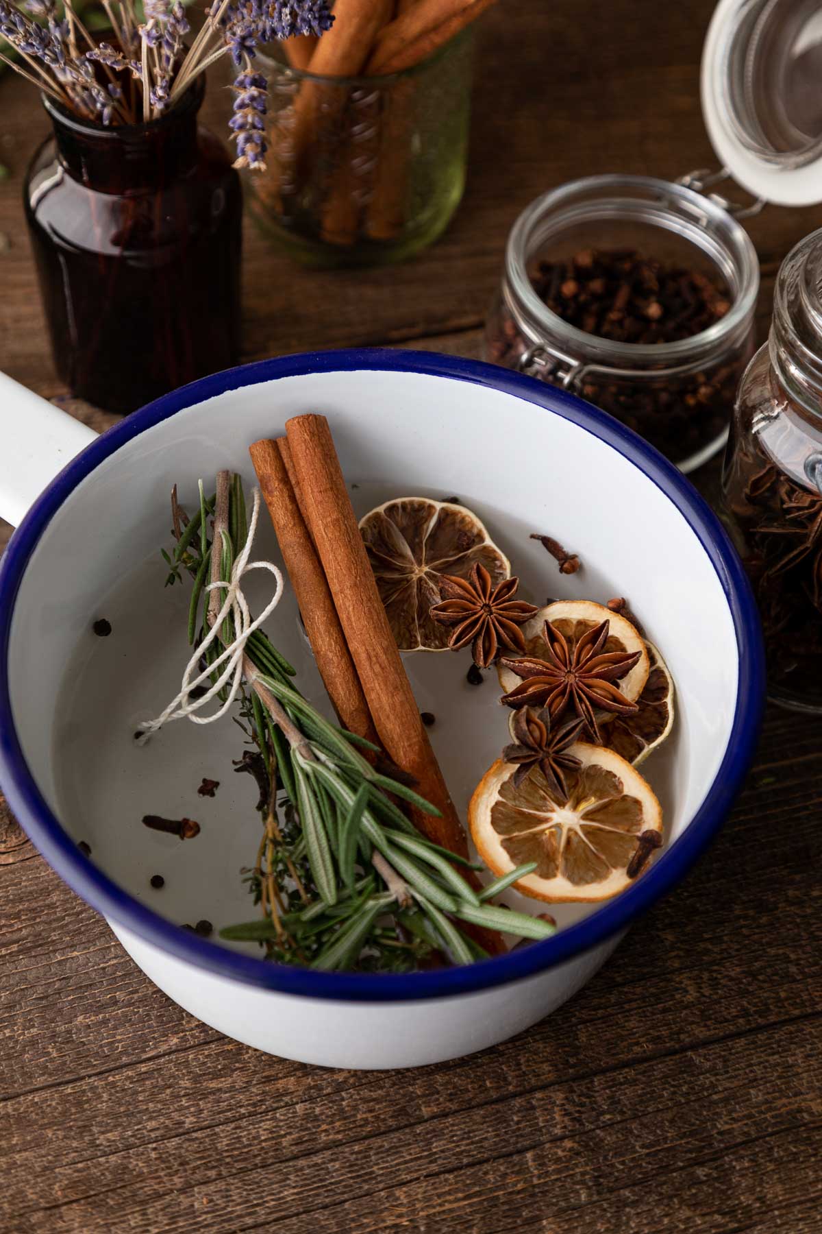 Stovetop Air Freshener - pot with water, cinnamon sticks, star anise, rosemary, and dried orange slices