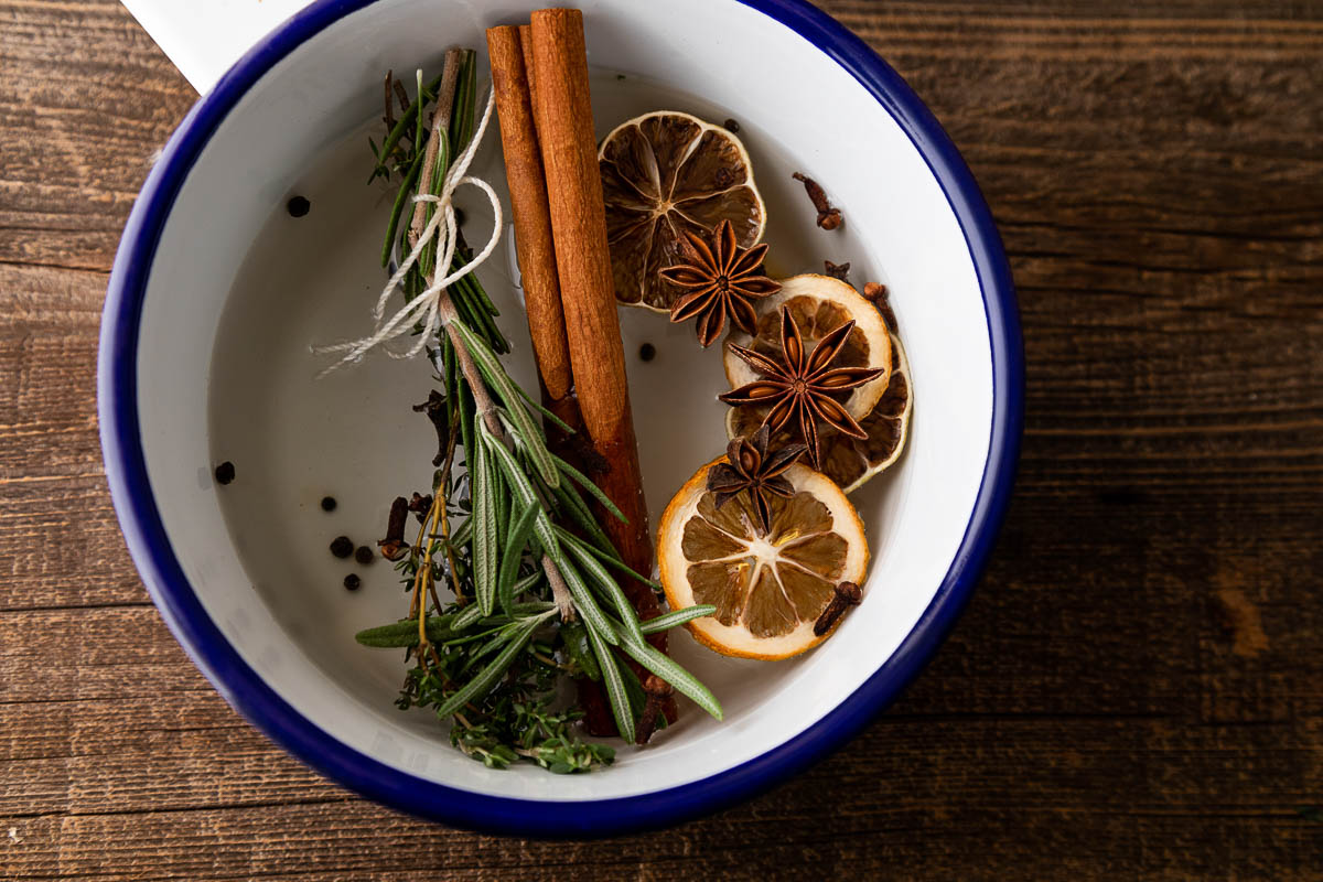 Stovetop Air Freshener - pot with water, cinnamon sticks, star anise, rosemary, and dried orange slices