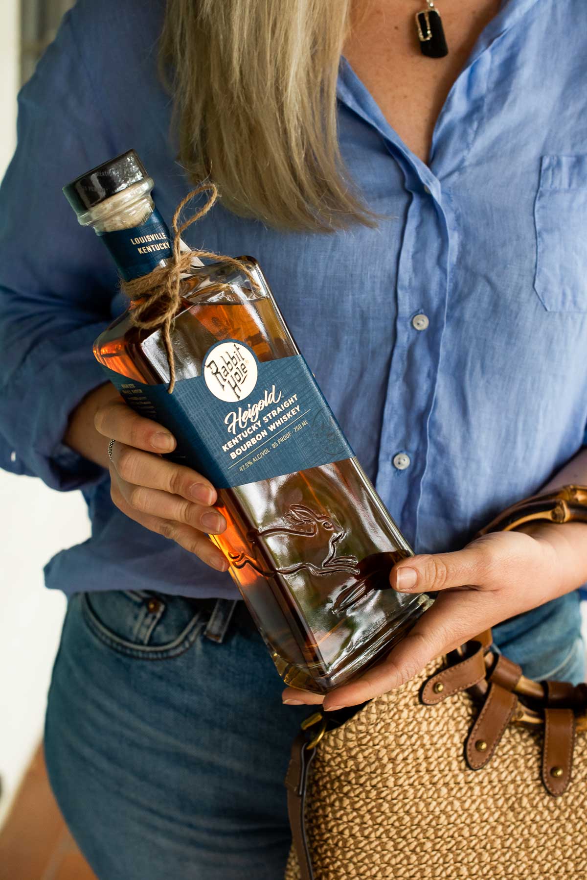 Sustainable Alcohol Brands - Luci Holding Rabbit Hole Distillery Bottle