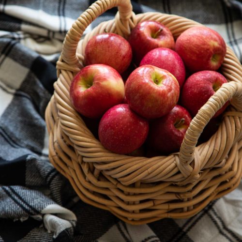Recipes for October - apples in basket on plaid blanket