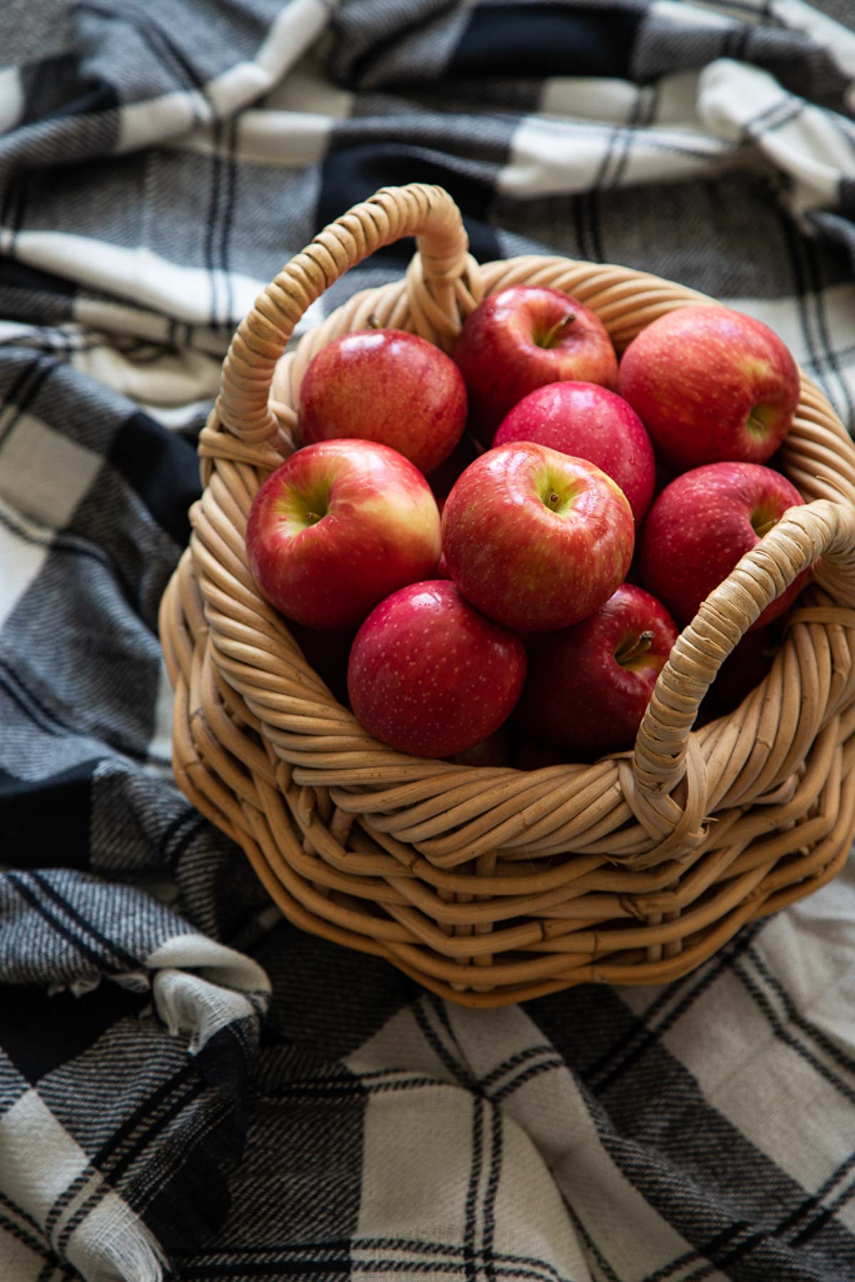 Apples in Basket on Blue Flannel Blanket