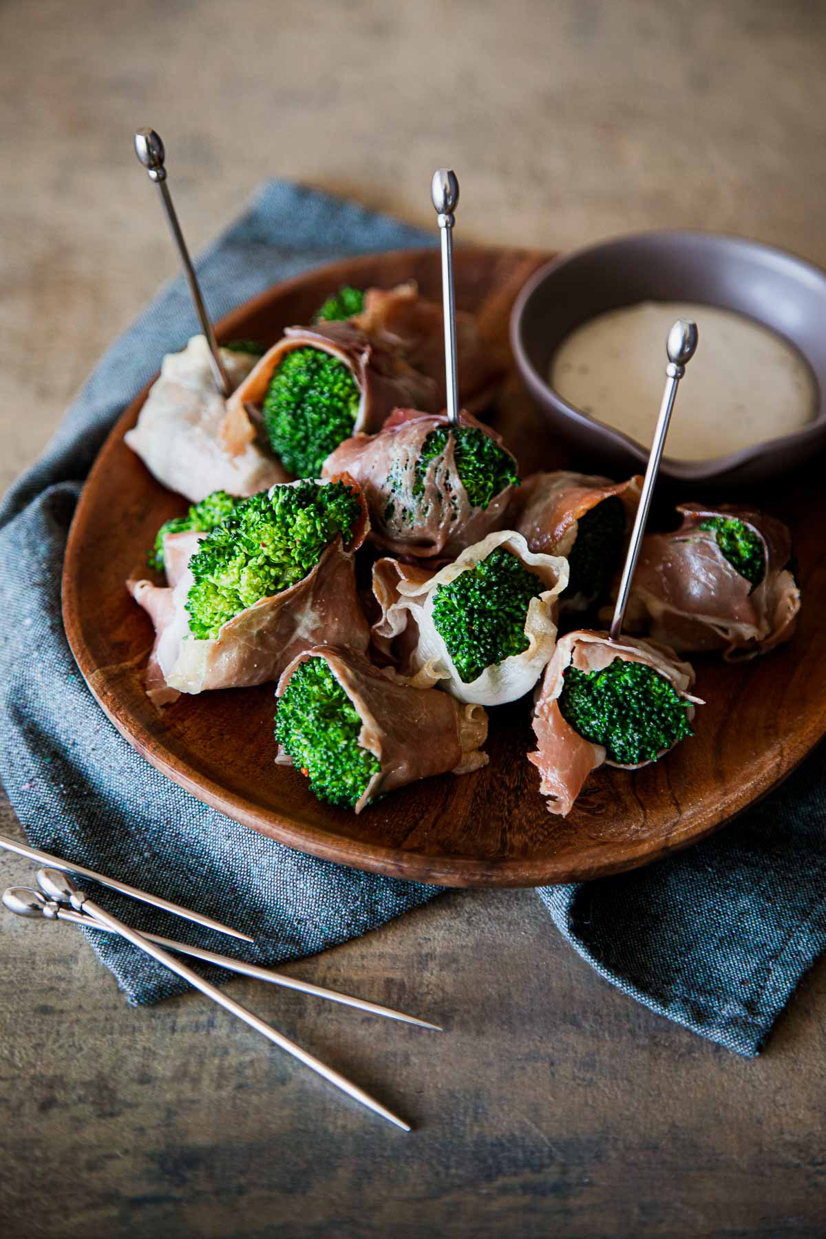Prosciutto Broccoli Appetizer on Plate with Skewers