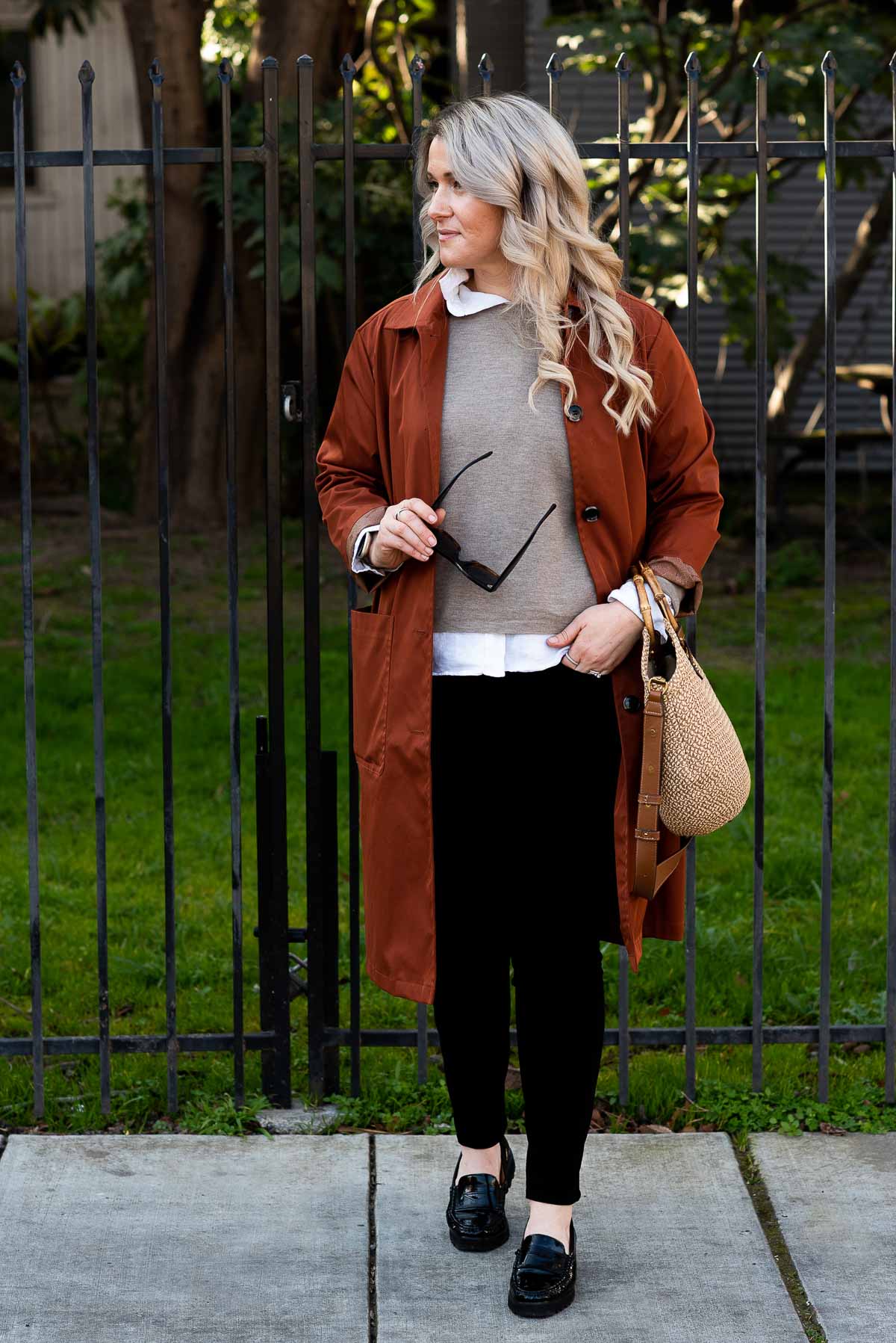 Minimalist Wardrobe - Luci wearing orange barn coat with Eric Javits My Way Bag