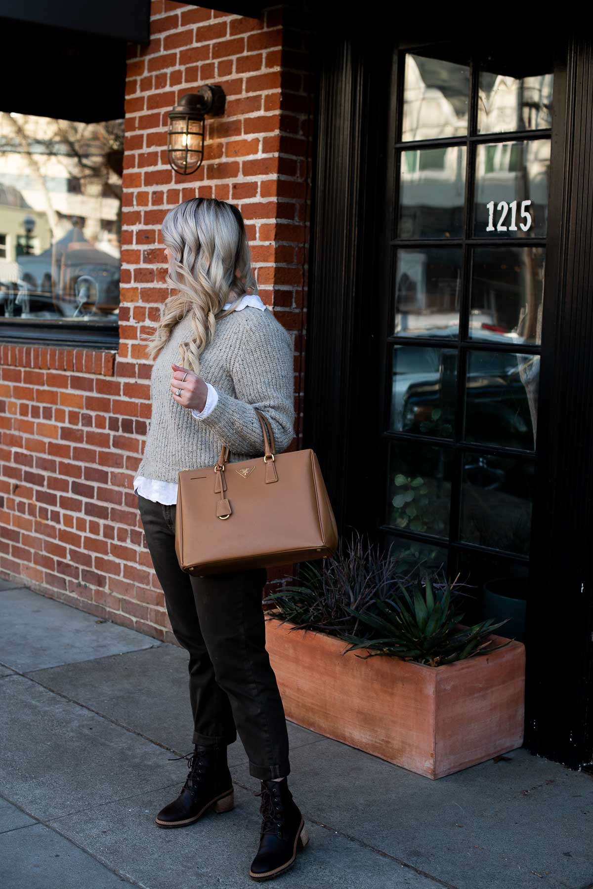 Linen in Winter Outfit - White LInen Button down under cashmere sweater, chinos, Prada tote, and Timberland boots