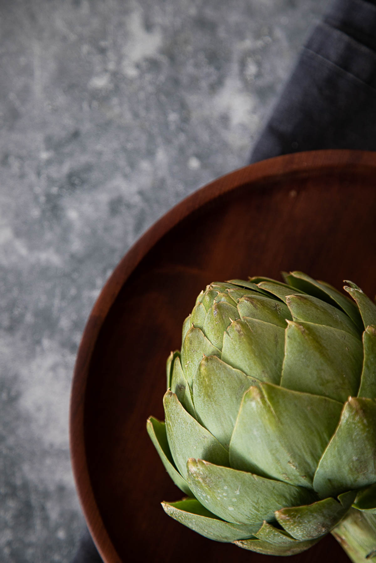 Artichoke in Wood Bowl