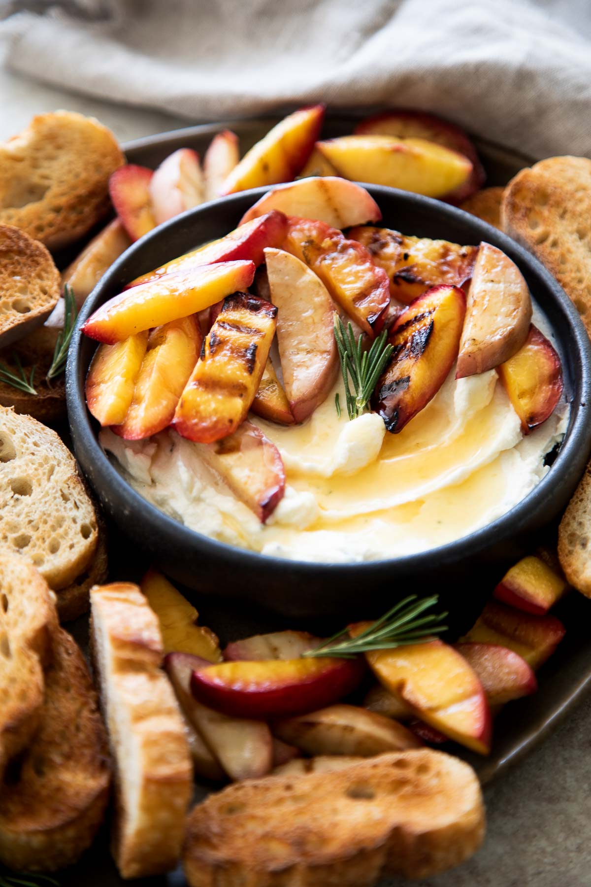 Whipped Goat Cheese Appetizer with Grilled Peaches and Crostini