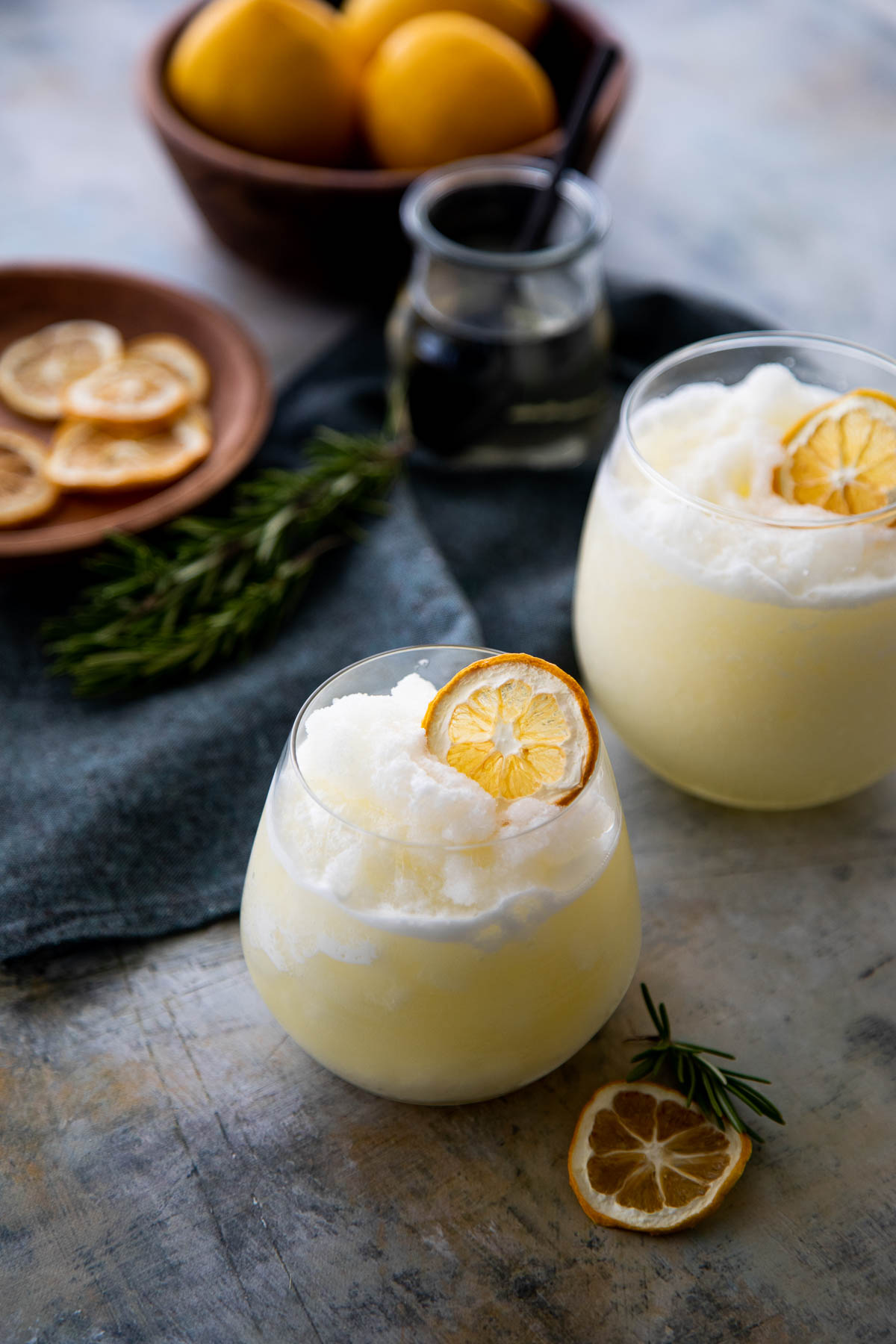 Two Glasses of Rosemary Lemonade Slushy