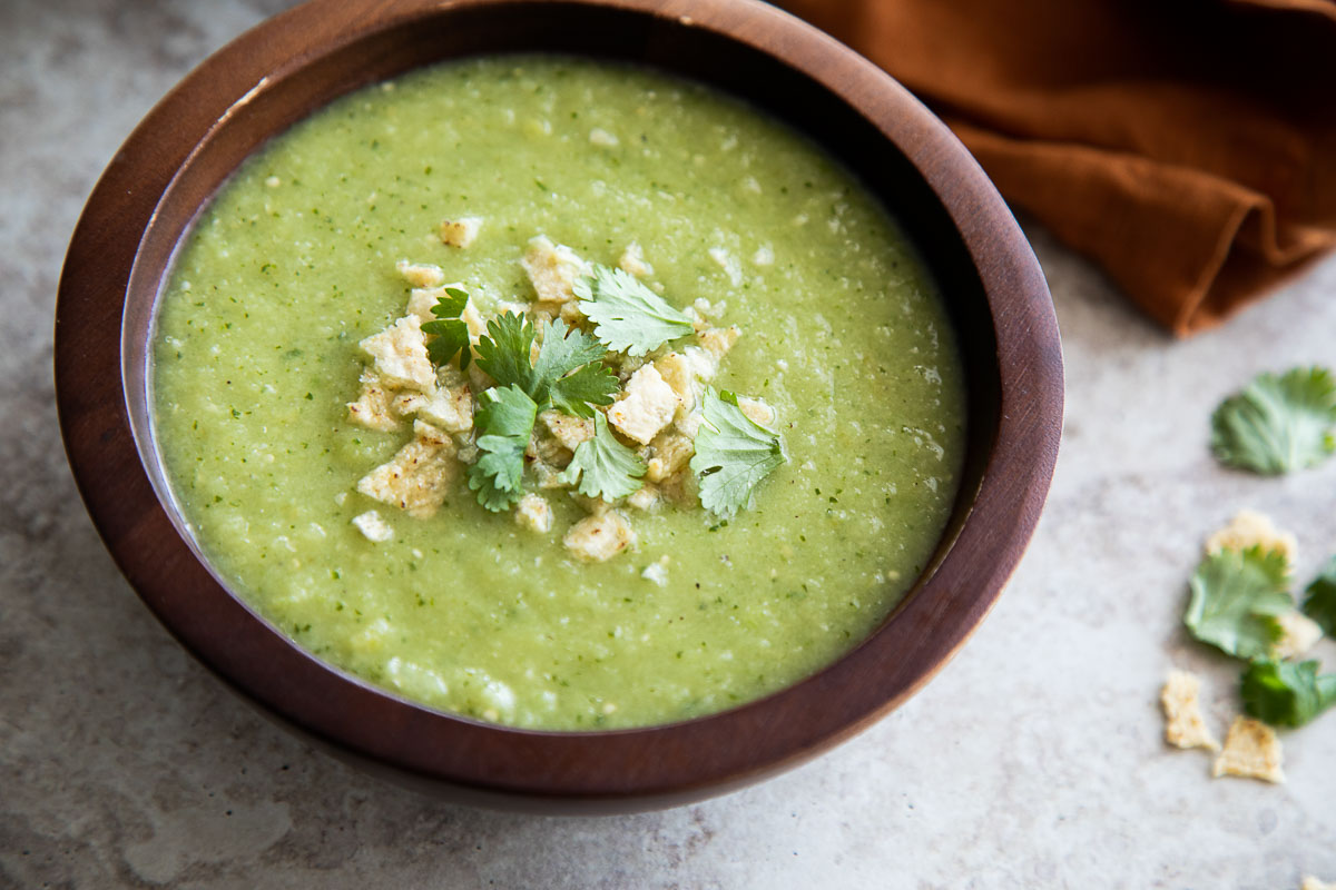 Pureed Tomatillo Soup in Brown Wood Bowl