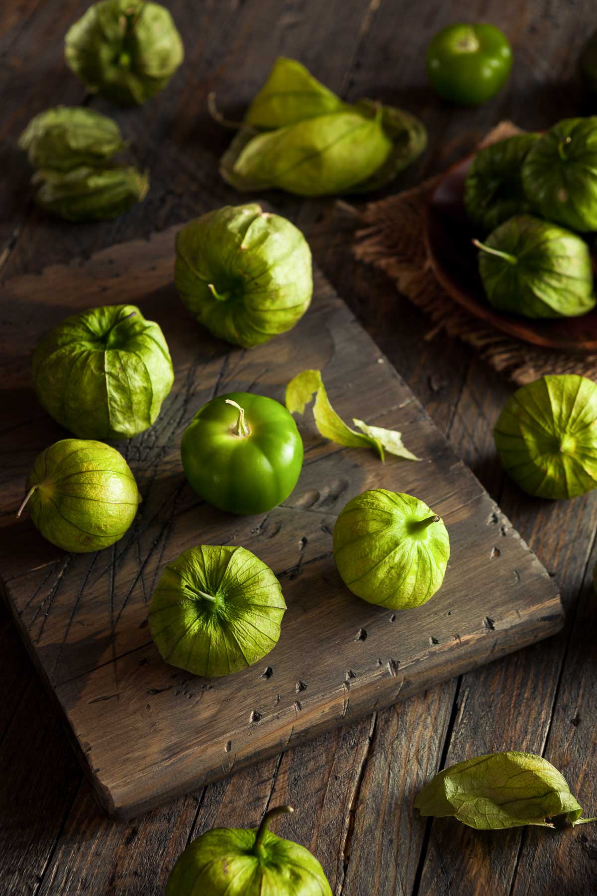 Tomatillos on Cutting Board