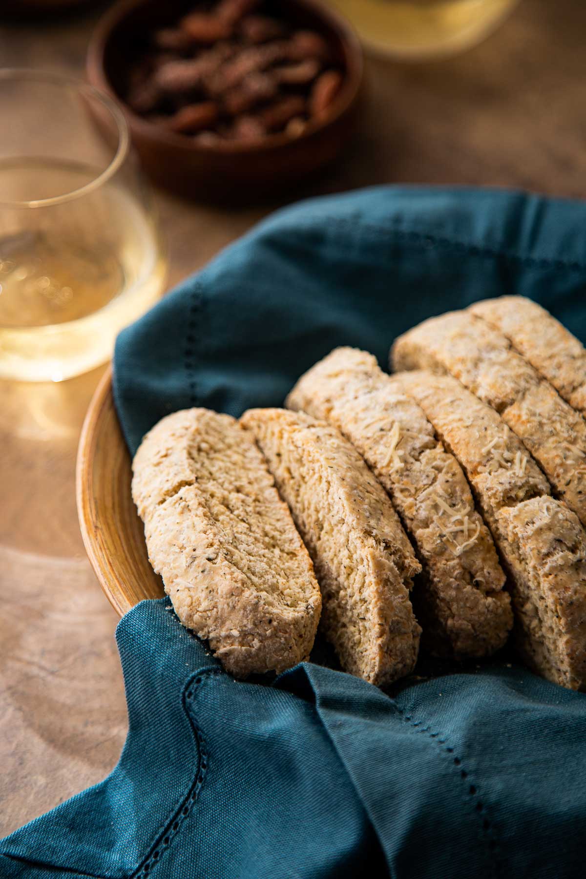 Savory Biscotti Cut Up into Blue napkin-lined bowl