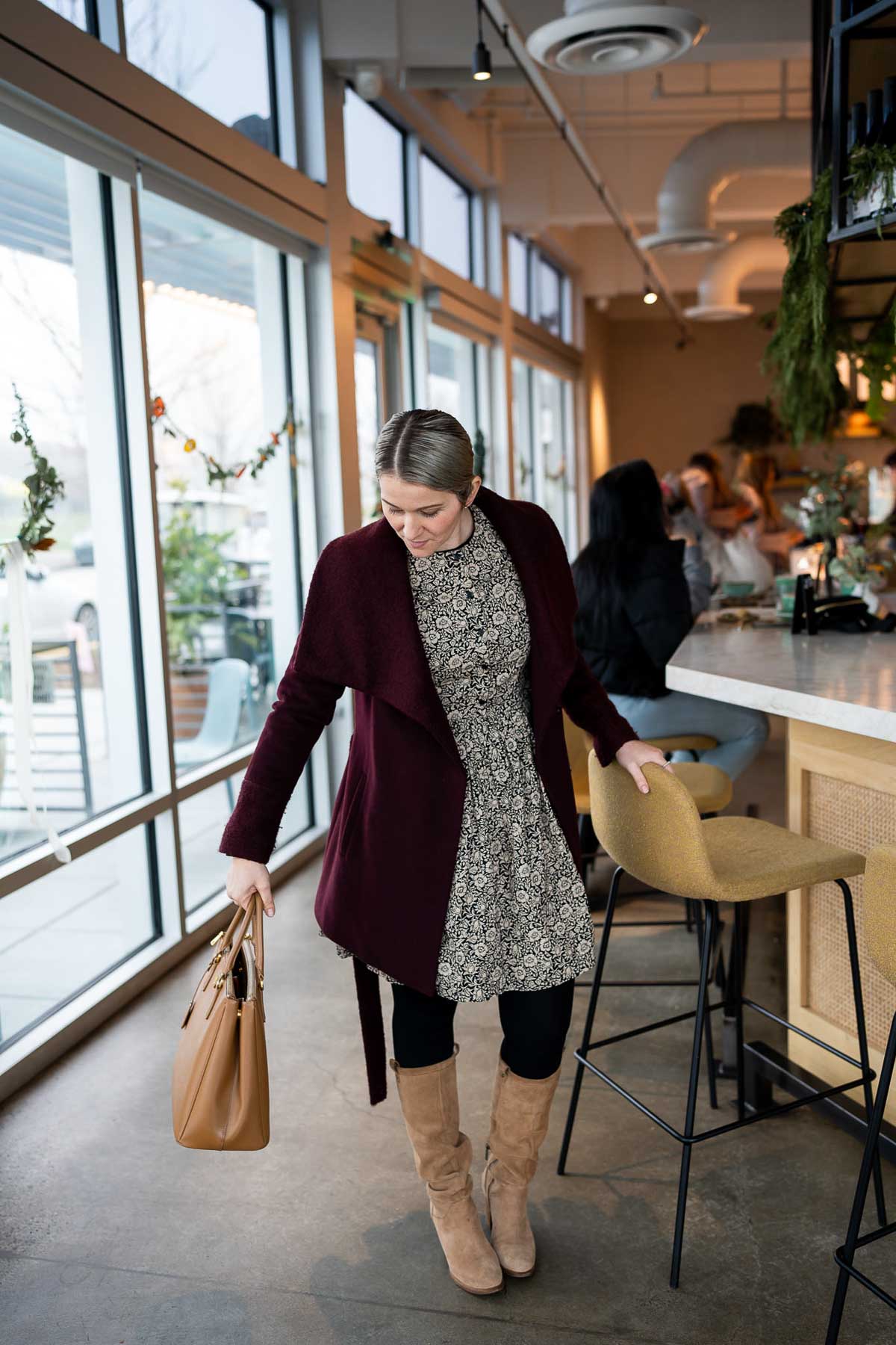 Sustainable Fall Dresses - Short, long sleeve black printed dress with burgundy overcoat.