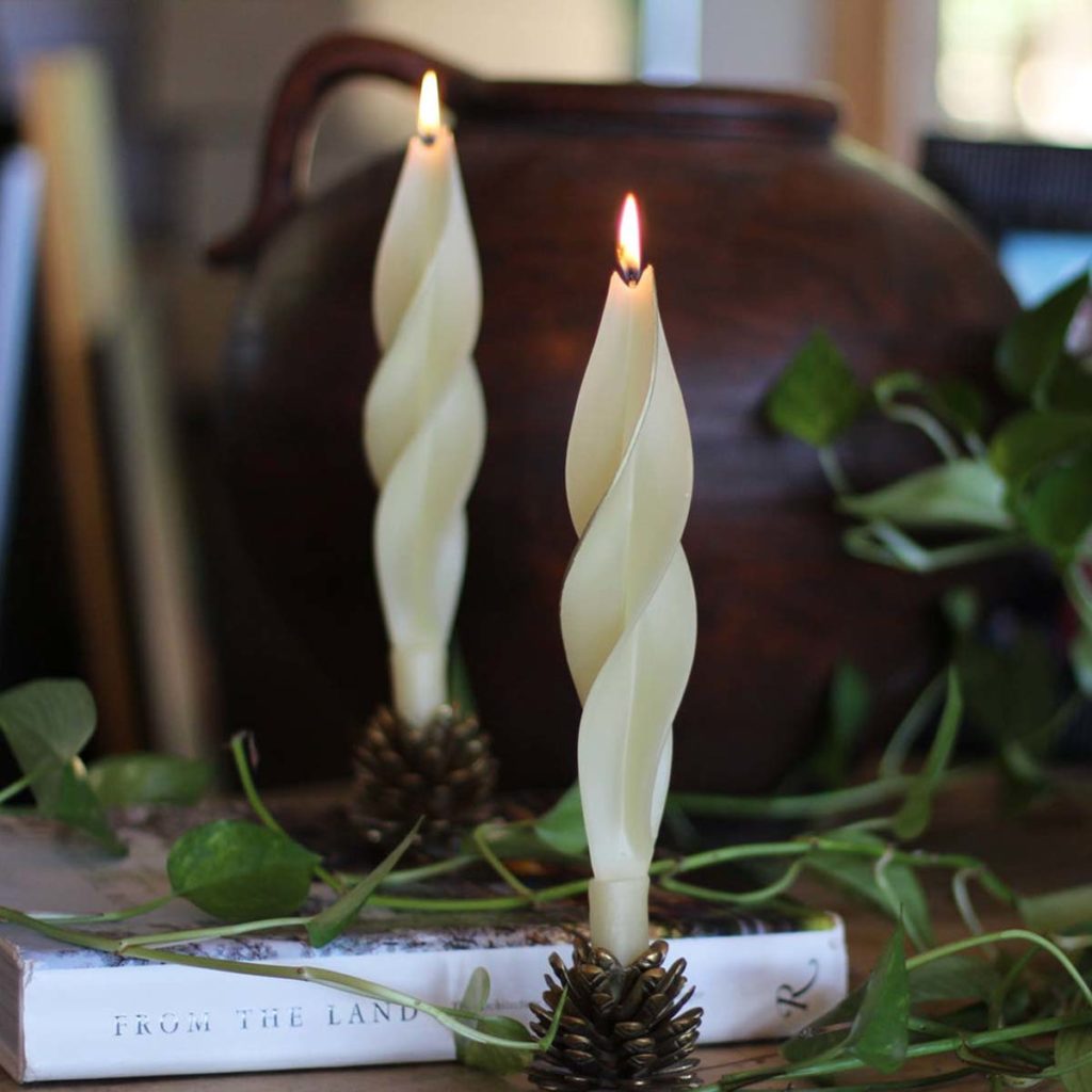 beautiful twisted candles burning - sustainable swaps