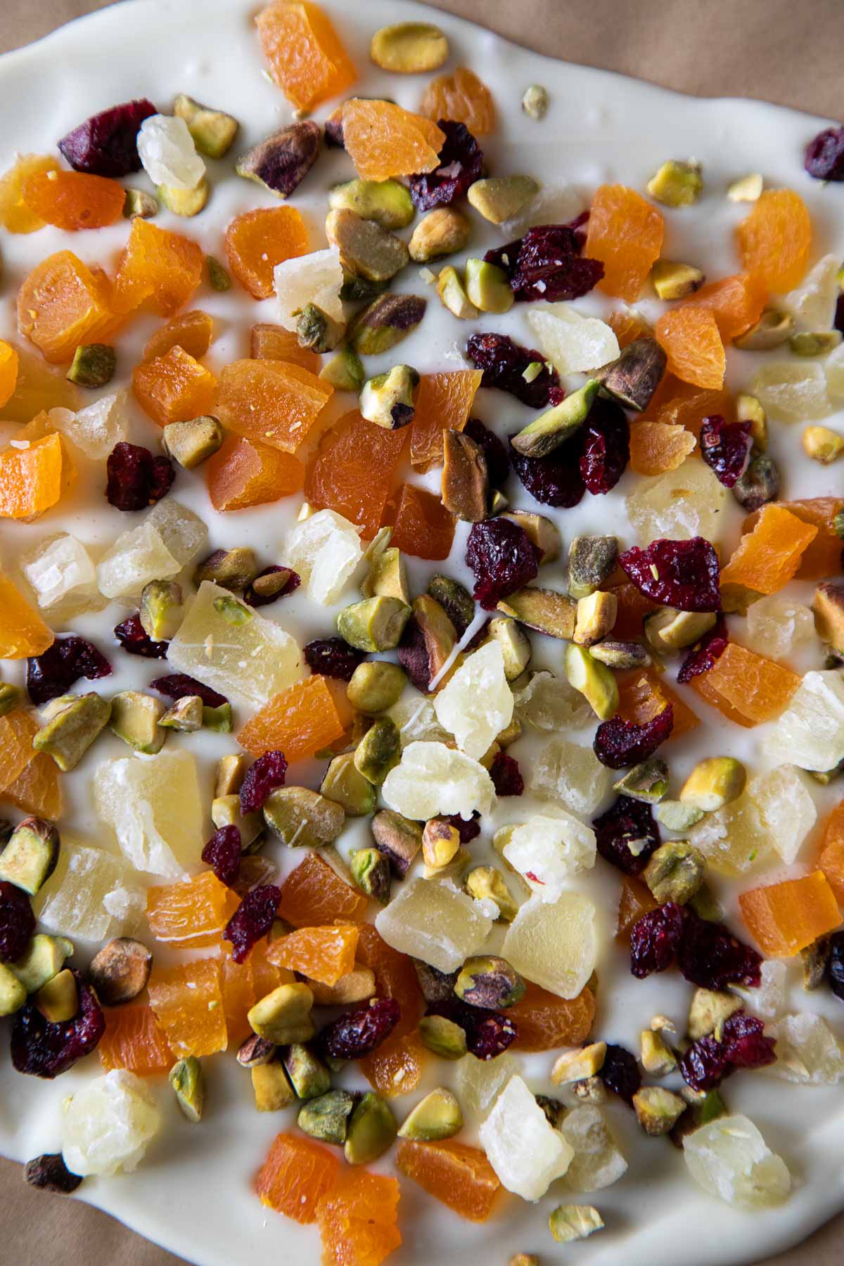 White Chocolate Bark - closeup with dried apricots, pineapple, cranberries, and pistachios