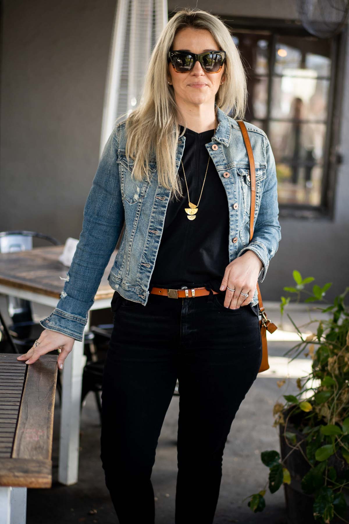What to Wear with a Jean Jacket - black shirt and black jeans.