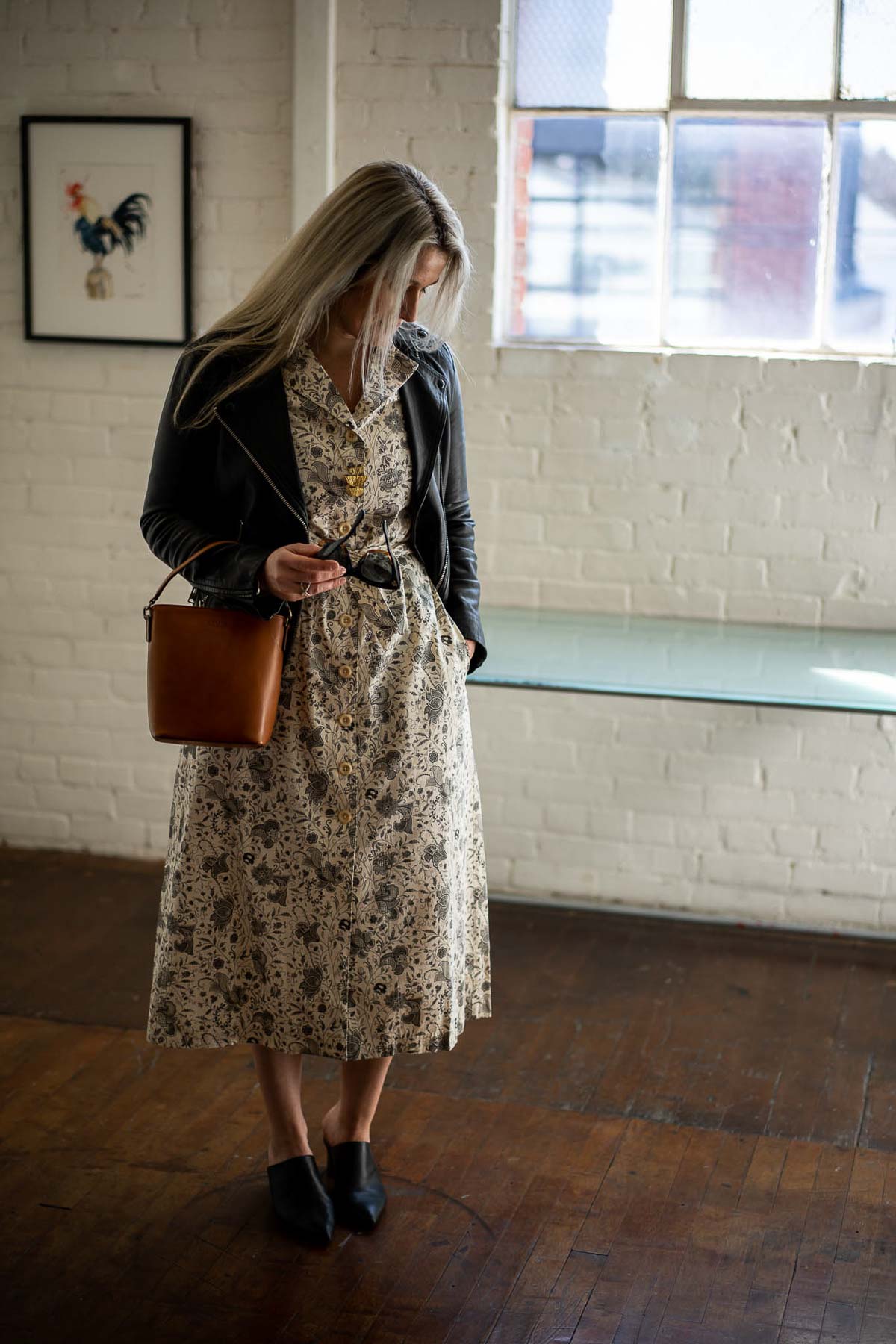 Sustainable Fall Dresses for Women -Black & White Patterned Dress with Leather Jacket and black mules