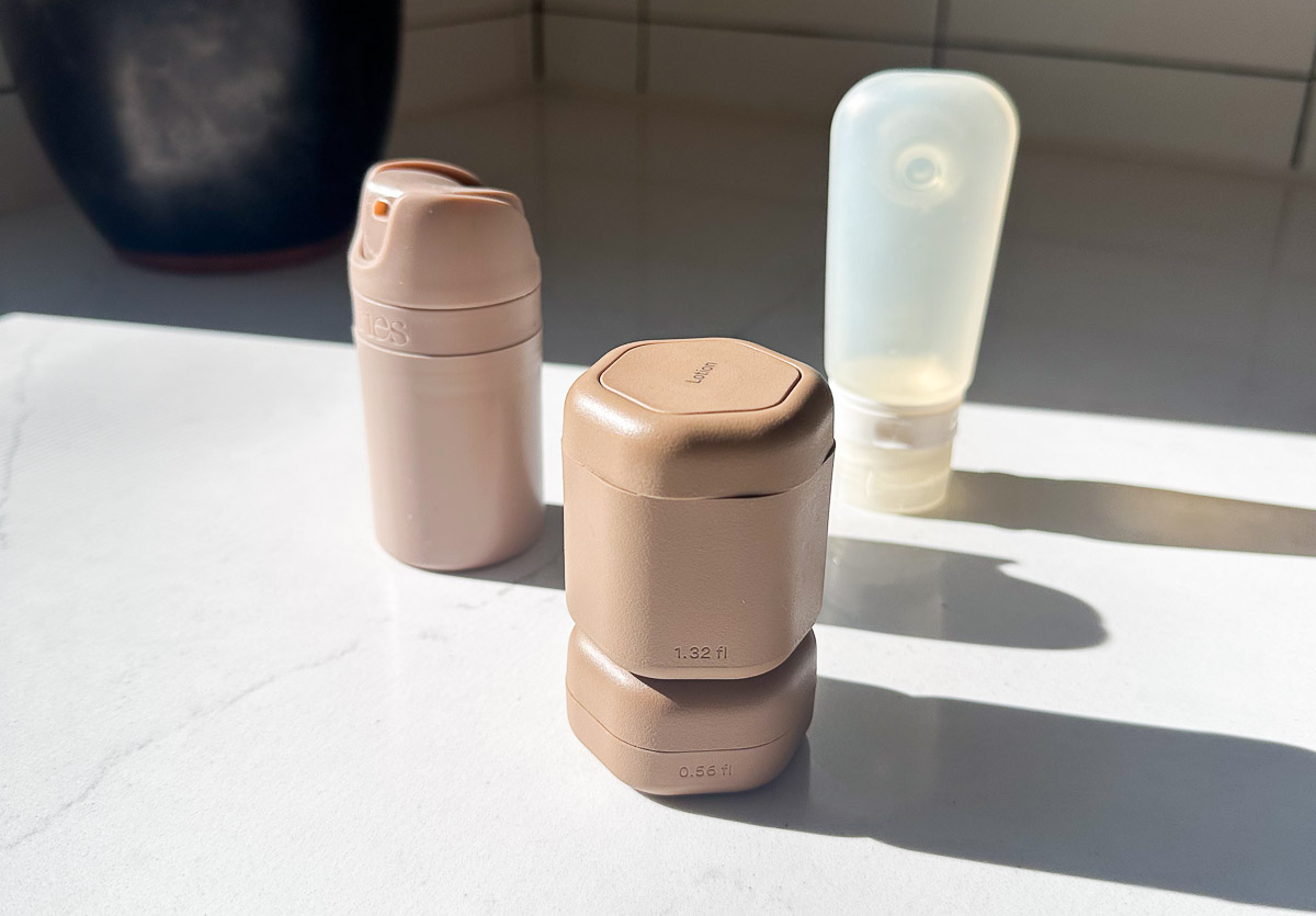 GoToobs, Ries, and Cadence refillable travel containers side by side