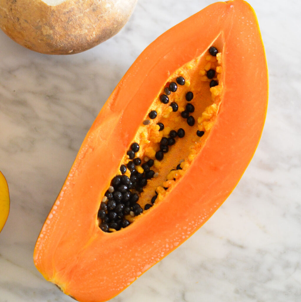 Fresh Papaya, cut open - in half