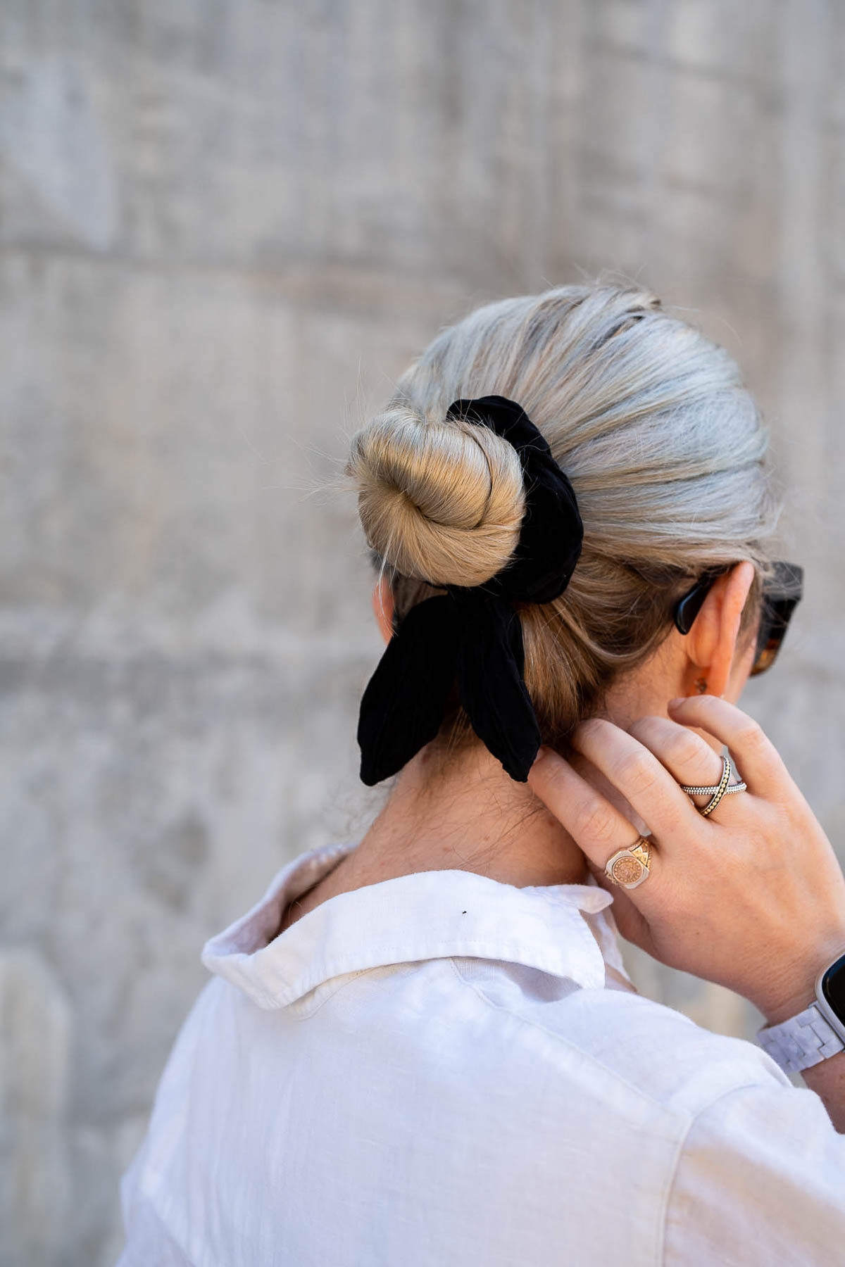 Back of hair - bun with black scrunchie