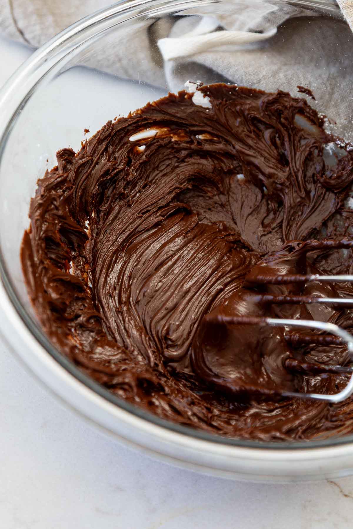 Chocolate Fudge Frosting in mixing bowl