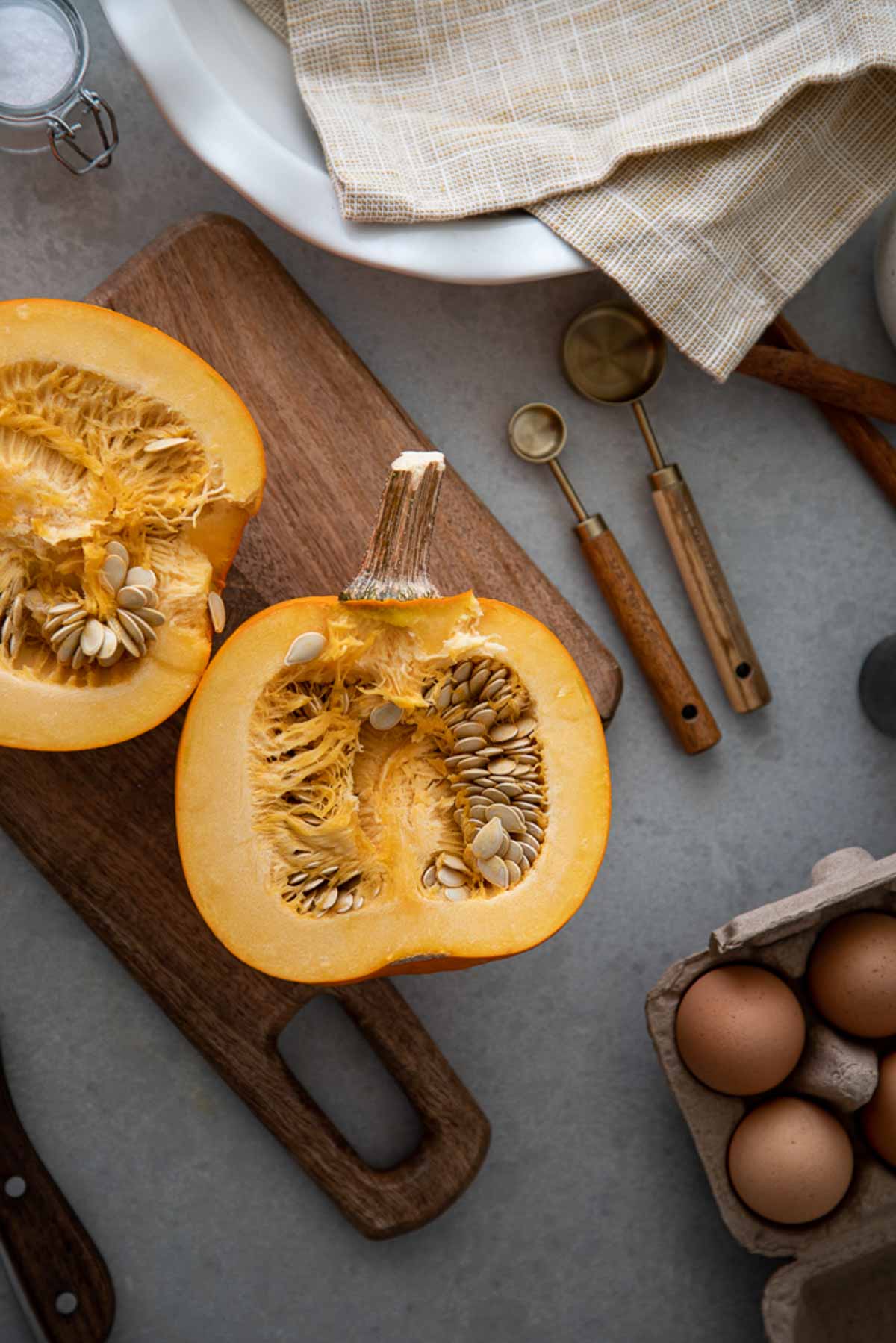 Sugar pumpkin cut in half with seeds removed