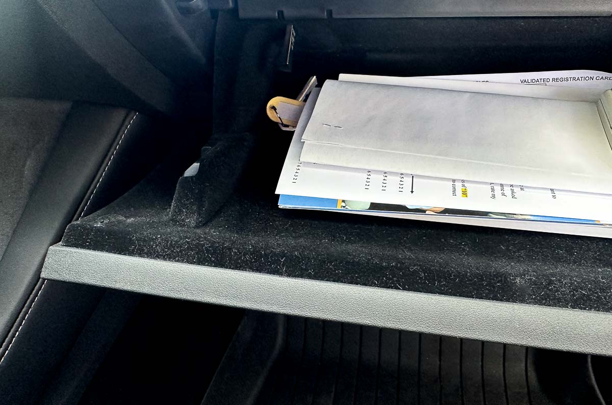 What to Keep In Your Car - documents in clean glovebox